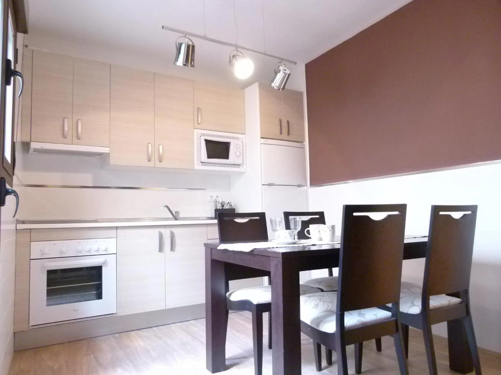 Kitchen or kitchenette in Alda Apartamentos Muralla de Toledo