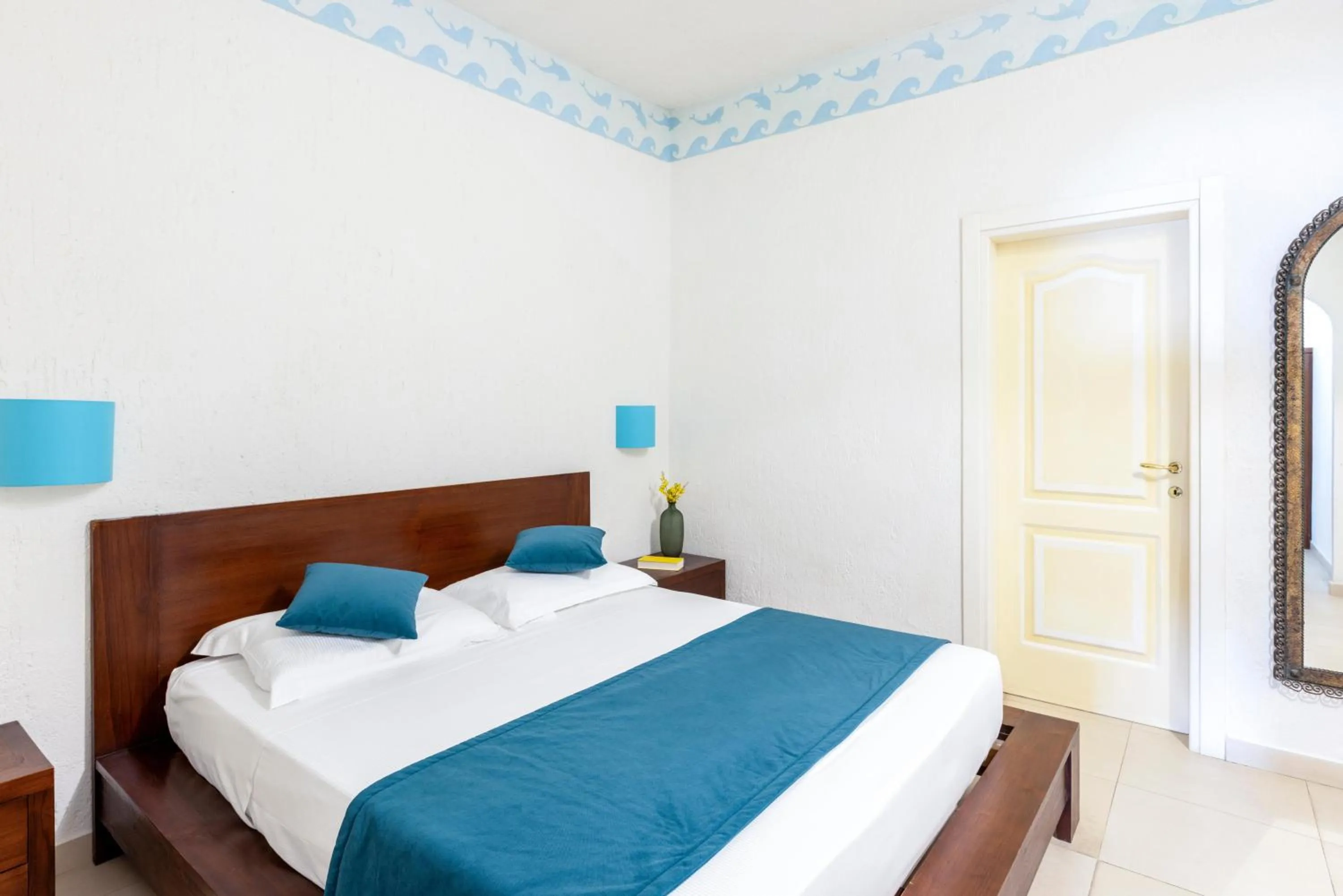 Photo of the whole room in Hotel Capo D'Uomo