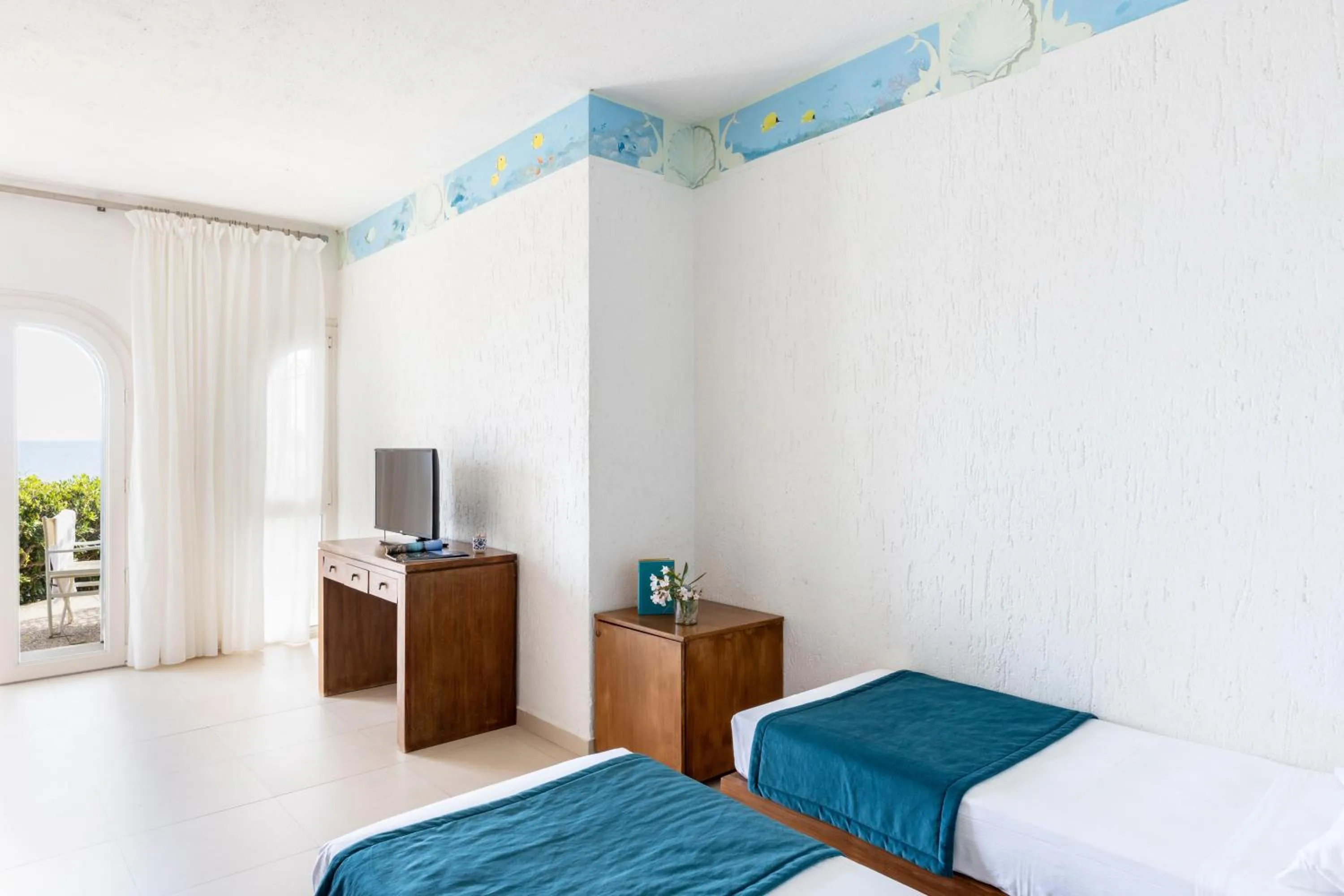 Photo of the whole room in Hotel Capo D'Uomo