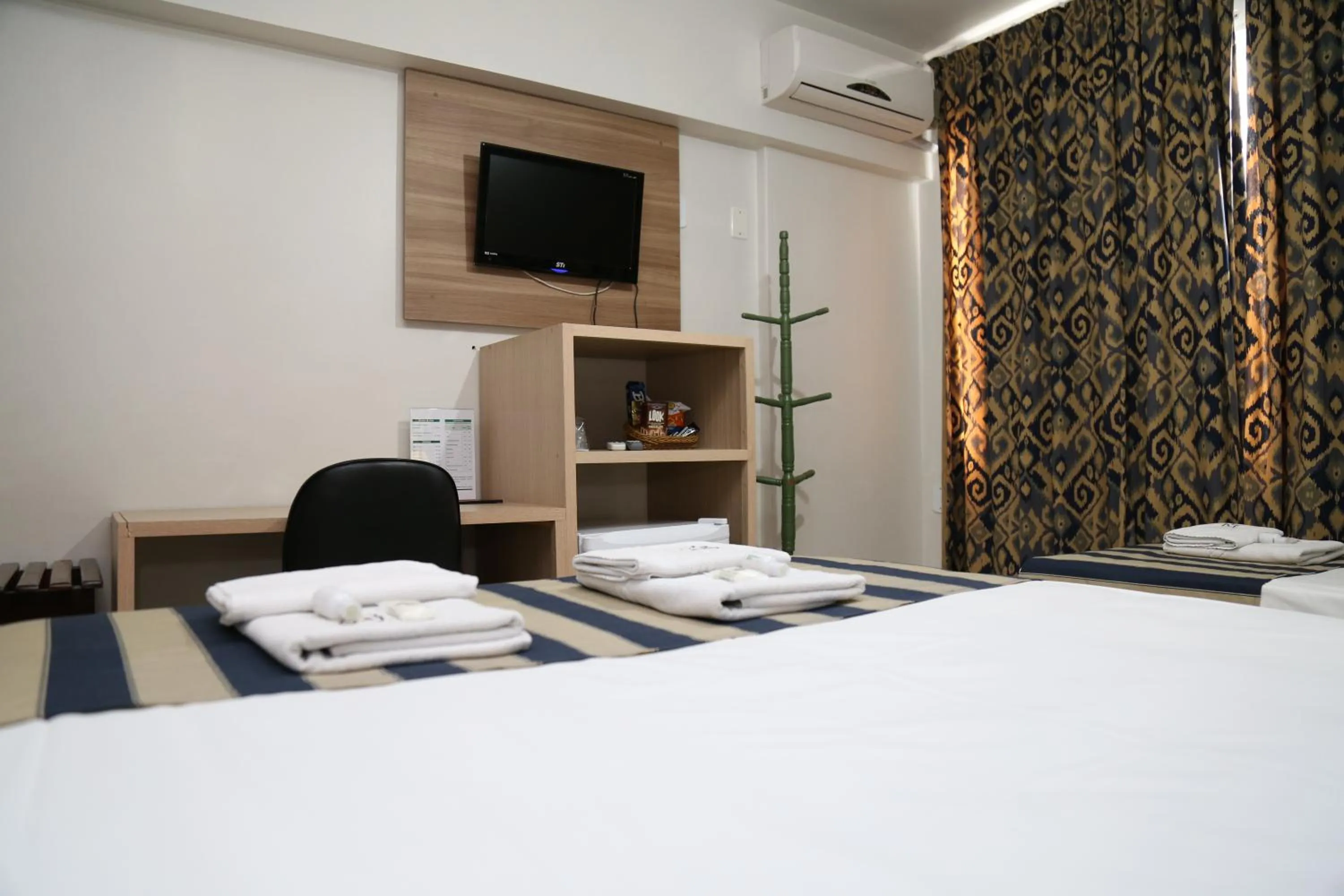 Bed in CHA Royal Plaza Hotel