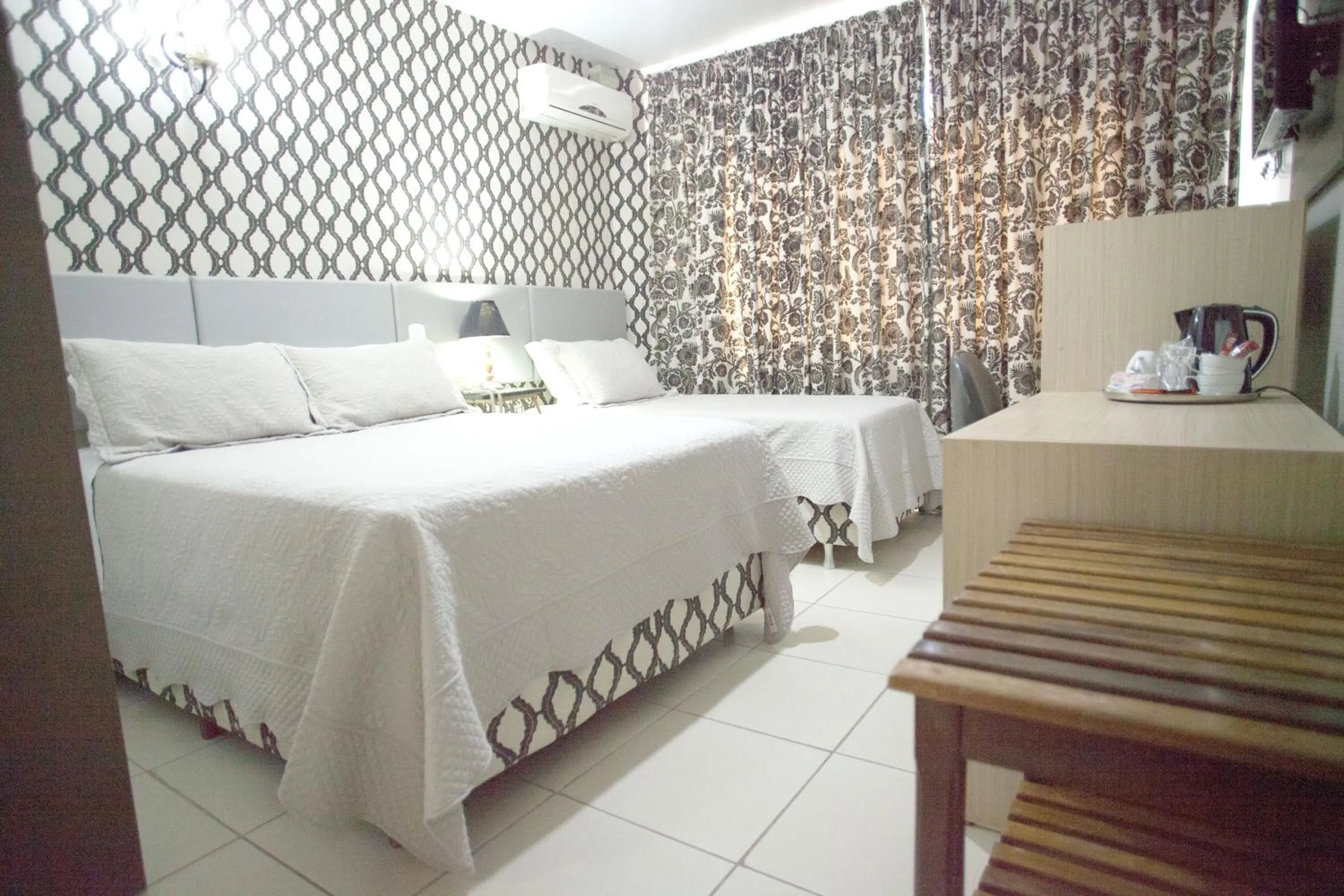 Bed in CHA Royal Plaza Hotel