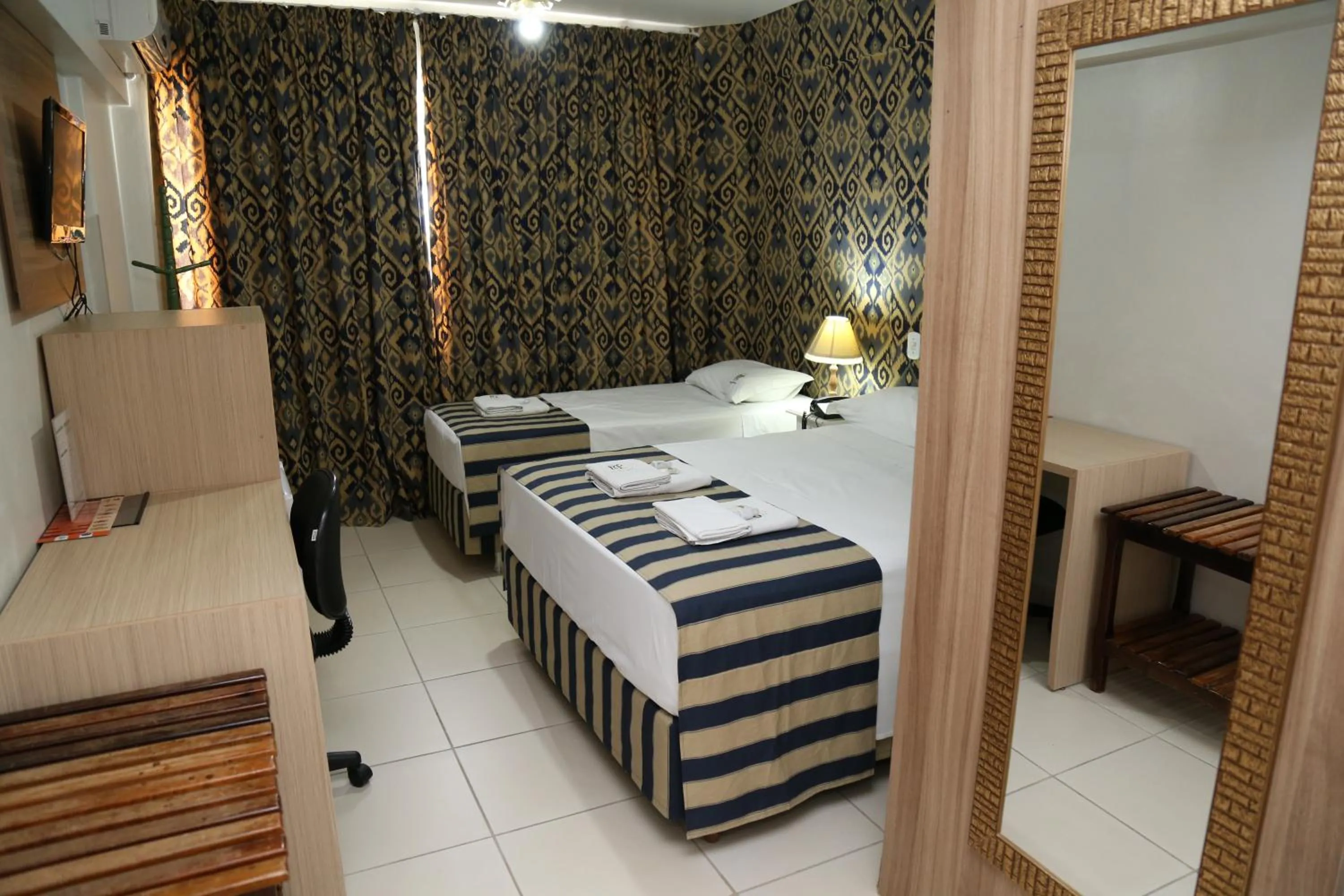 Bed in CHA Royal Plaza Hotel