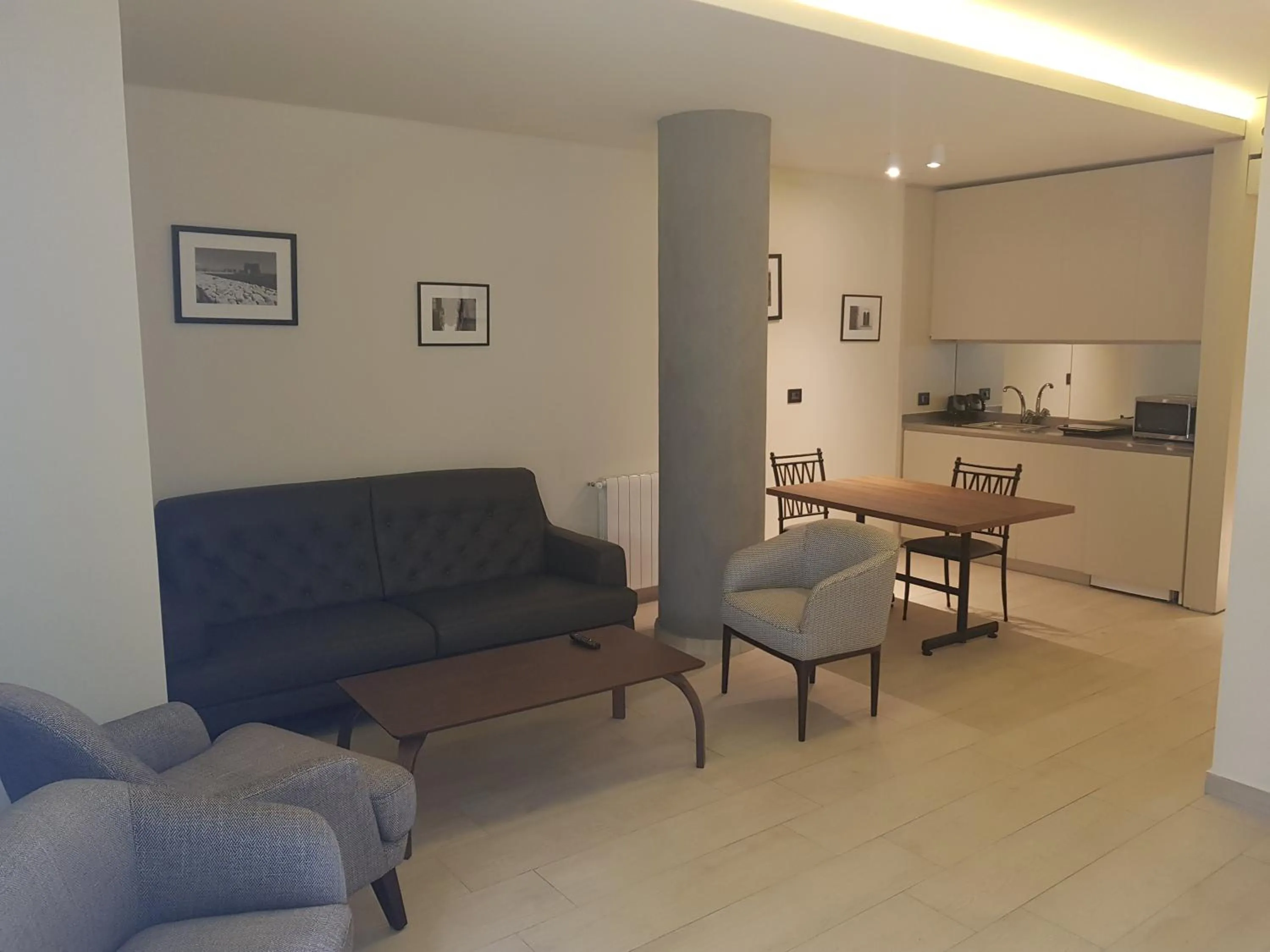 Seating area in Le Pave Hotel