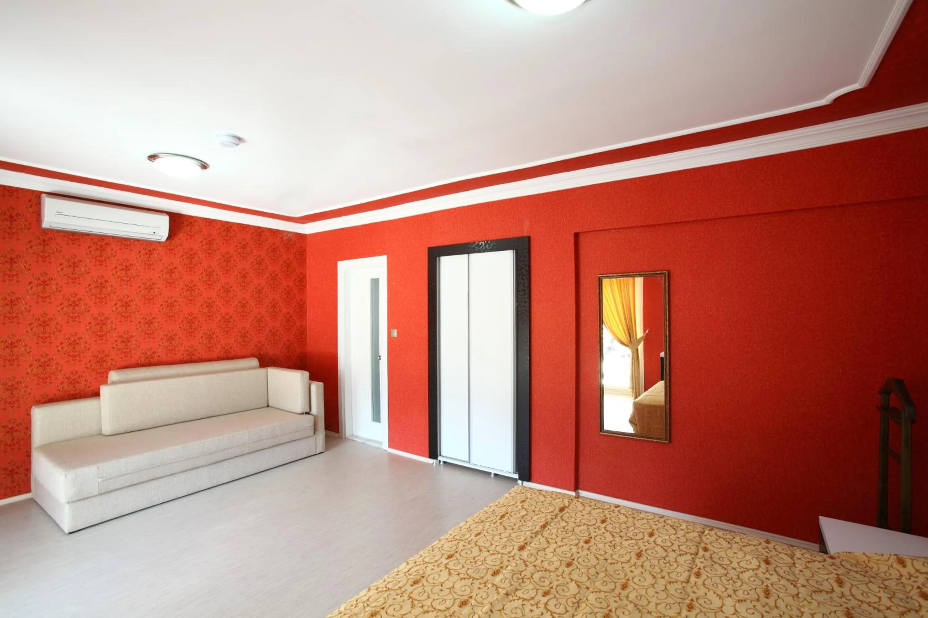 Seating area, Bed in Delfi Hotel Spa & Wellness Center