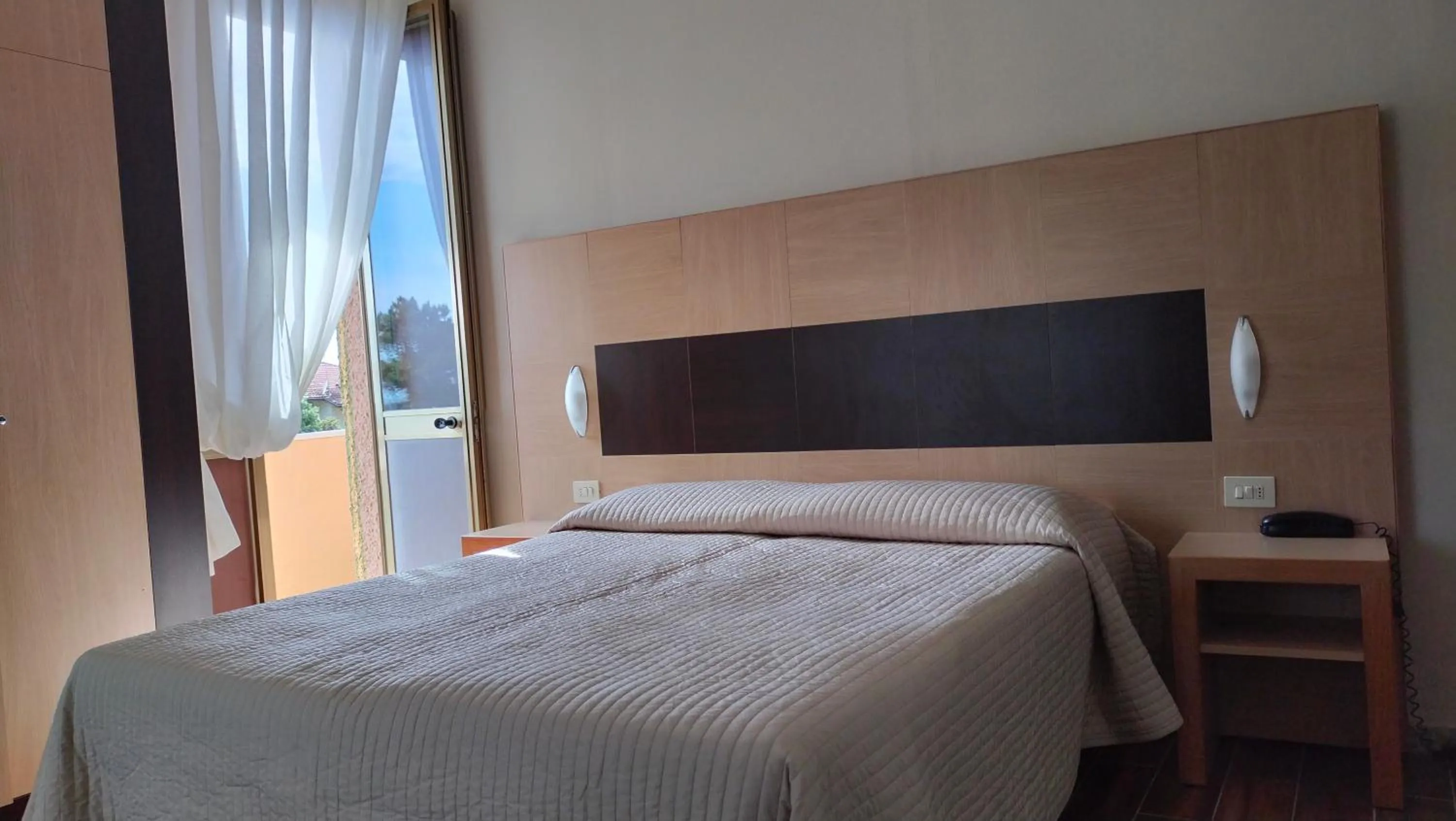 Bed in Albergo Battelli Only Adults