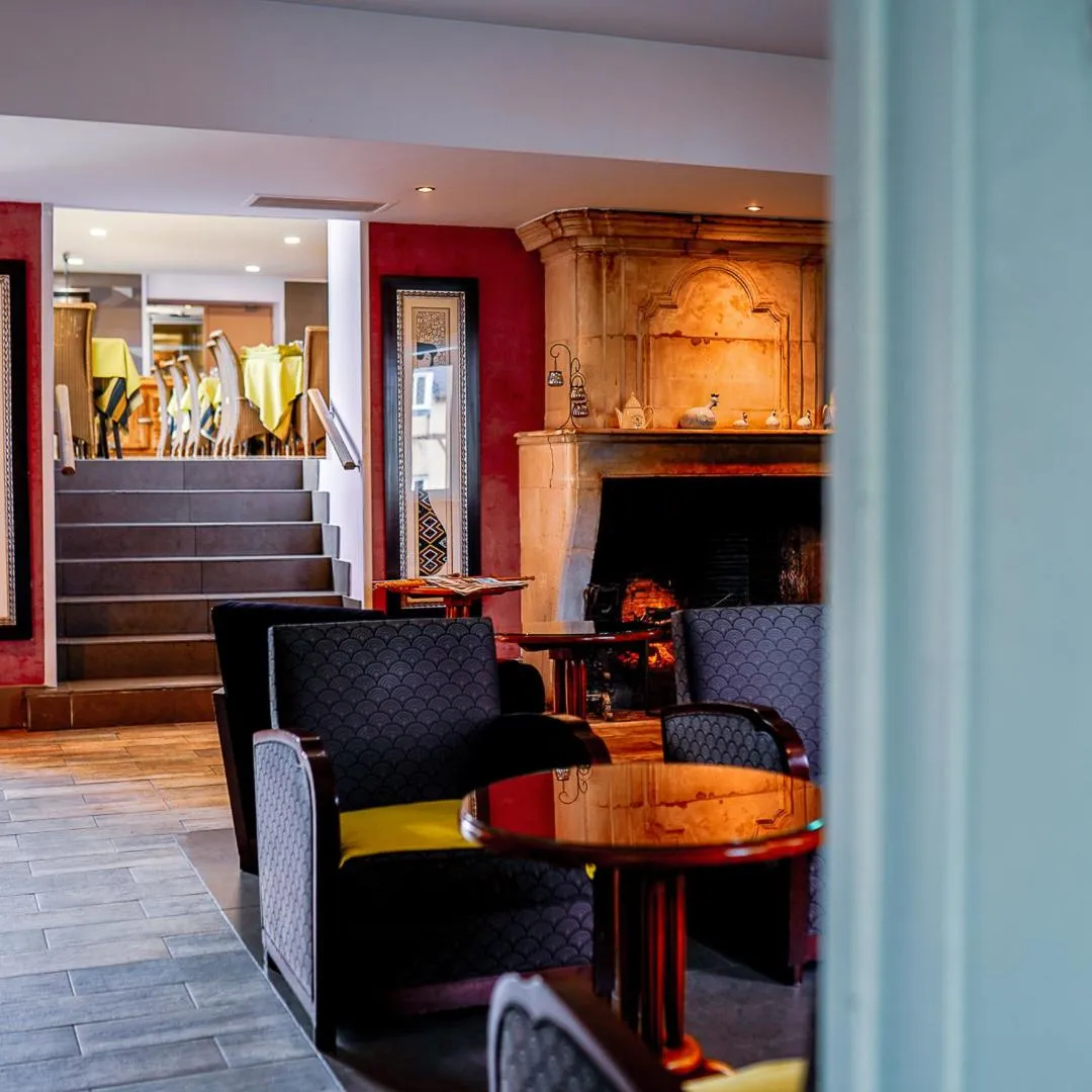 Communal lounge/ TV room in Auberge du Manet