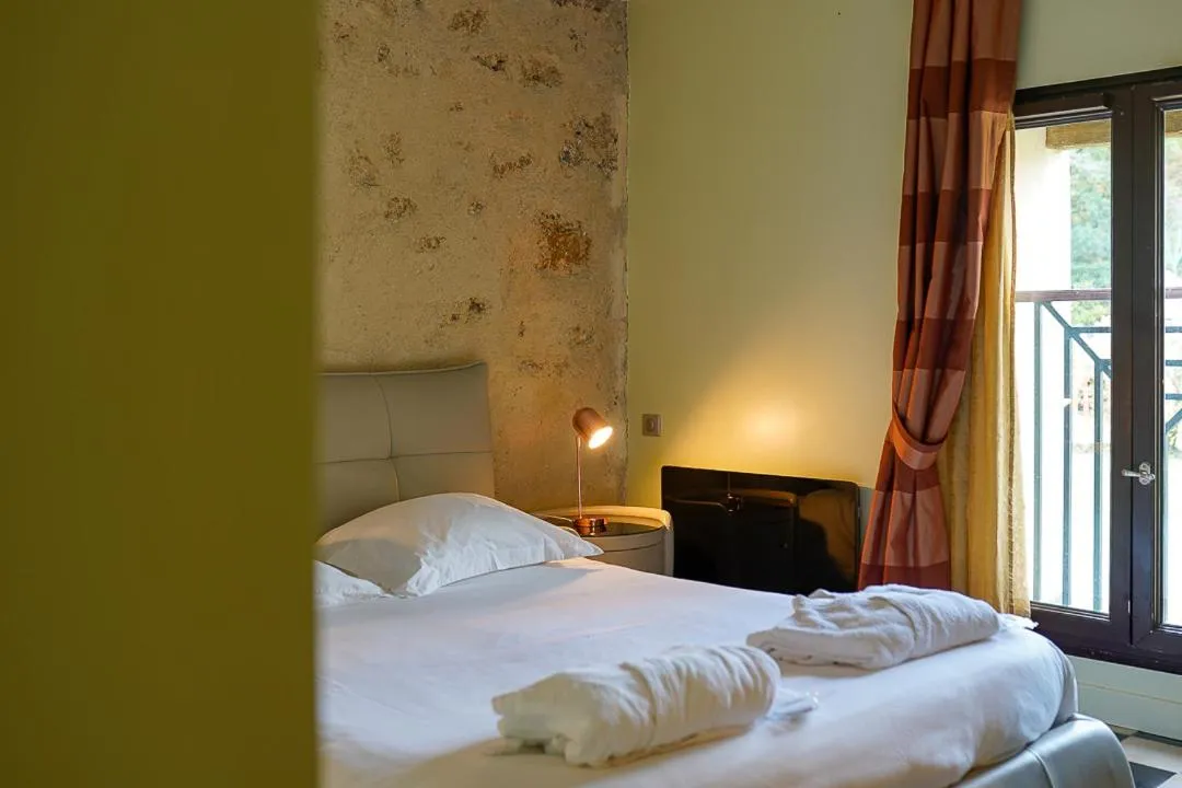 Bed in Auberge du Manet