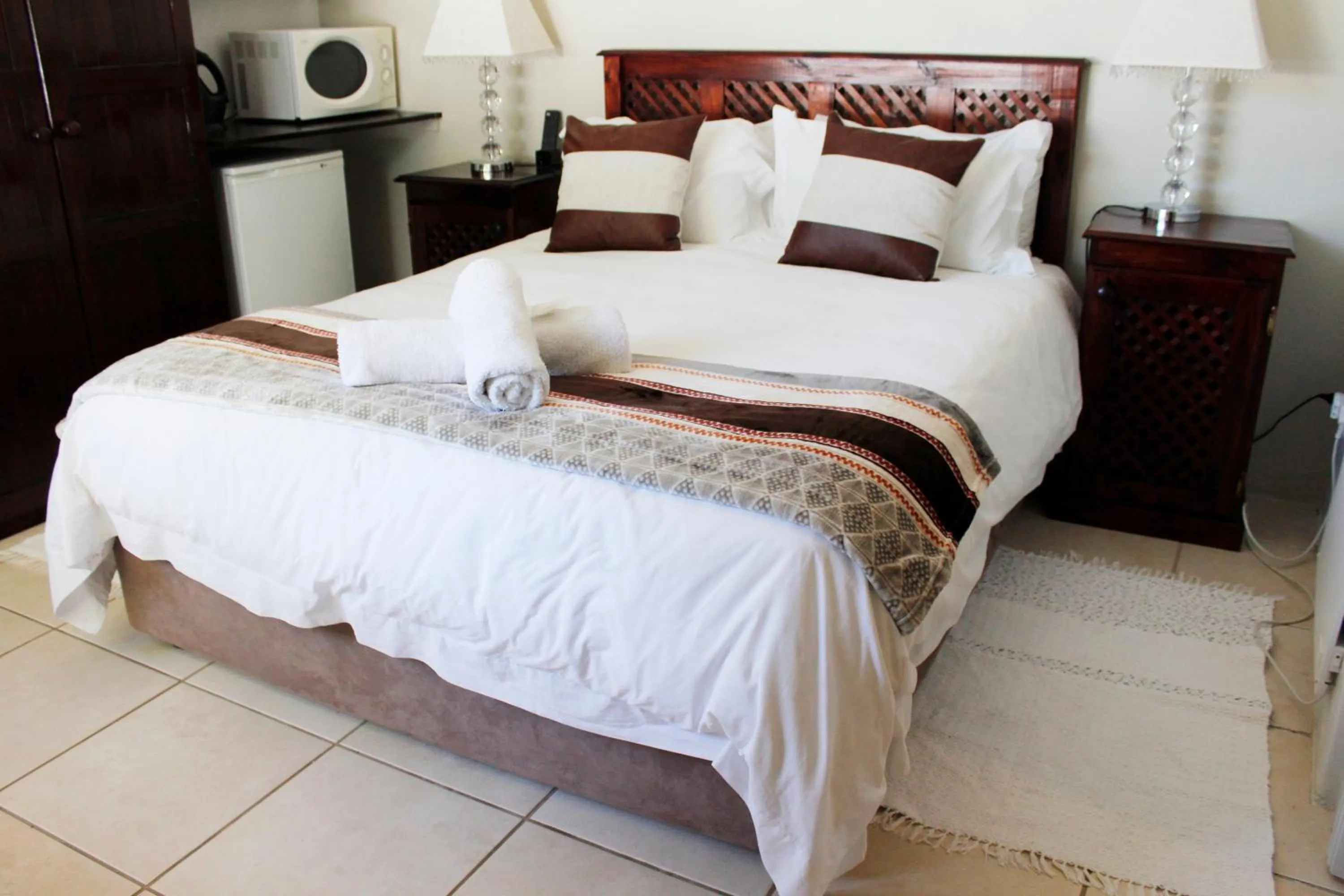 Bed in Amani Guest Lodge