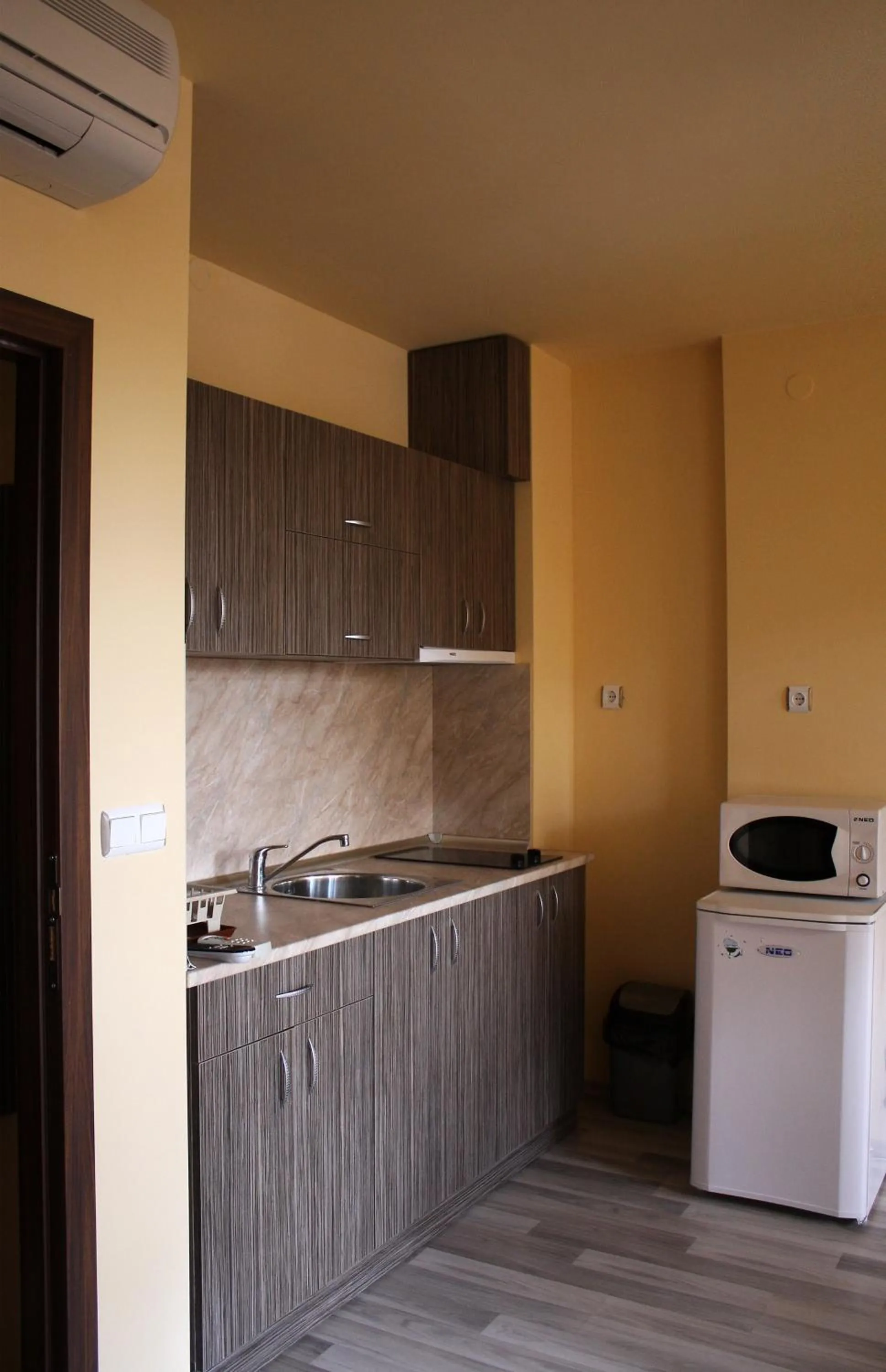 Kitchen or kitchenette in Aparthotel Pine Hills Pamporovo