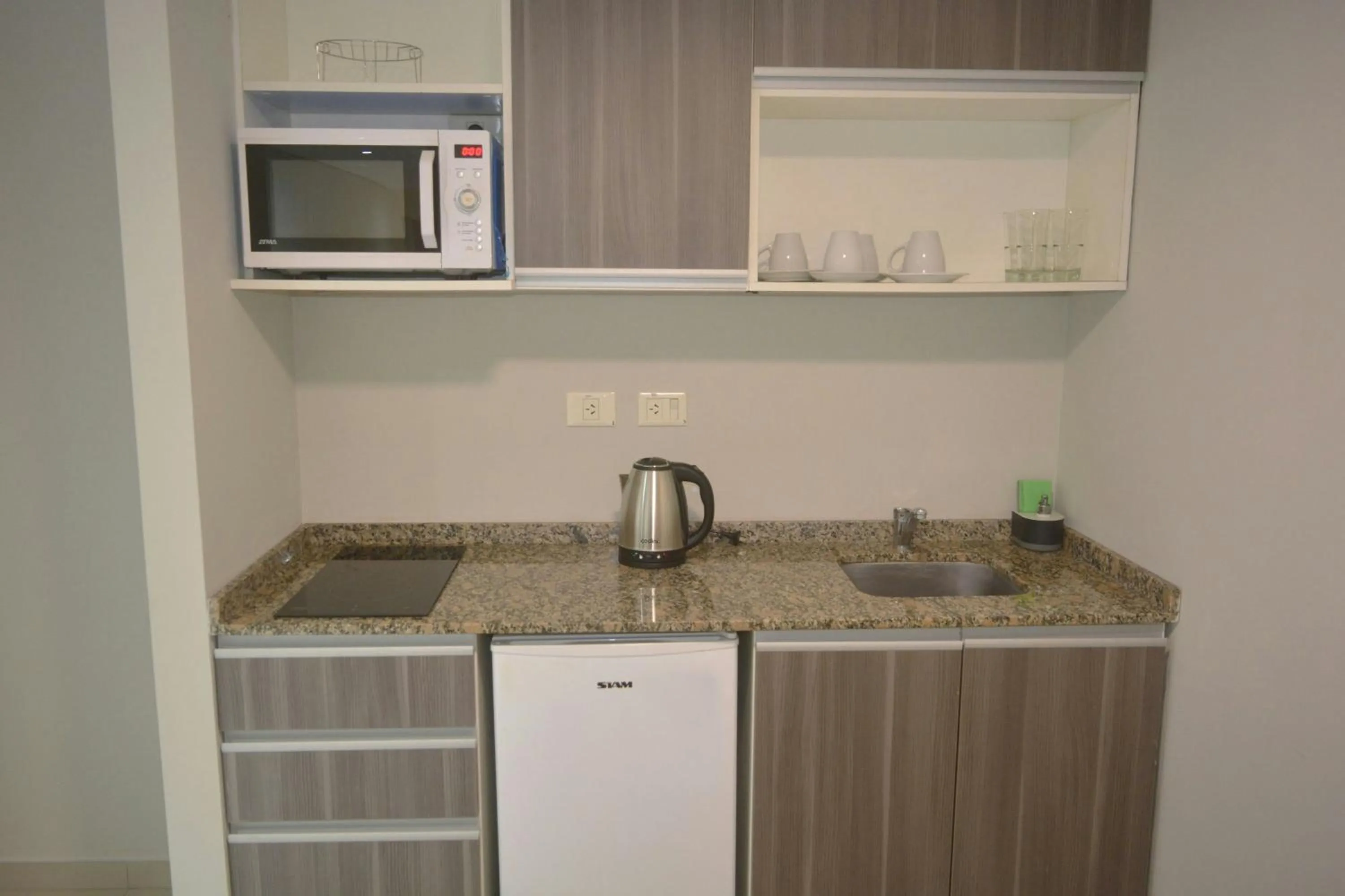 Kitchen or kitchenette in City Falls Iguazú