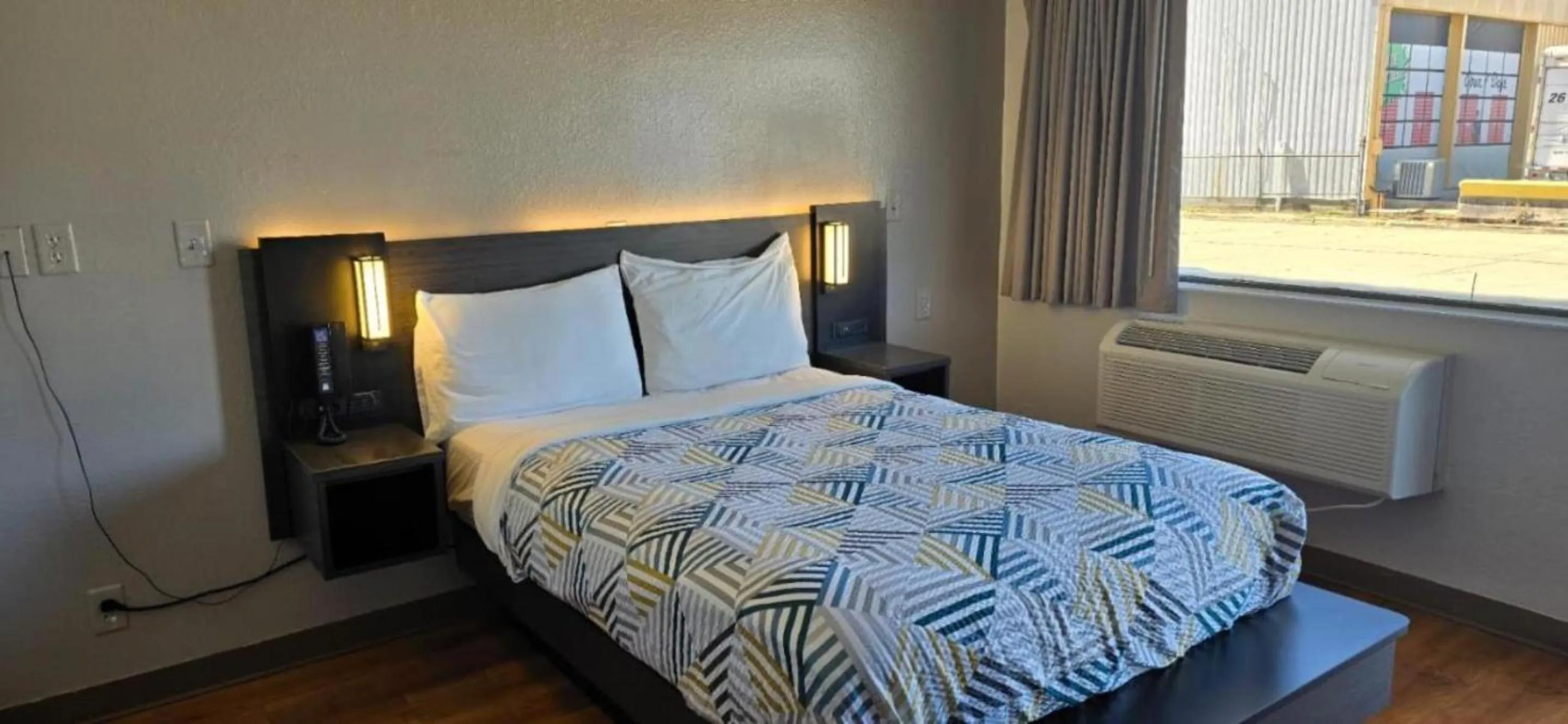 Bed in Motel 6-Slidell, LA - New Orleans