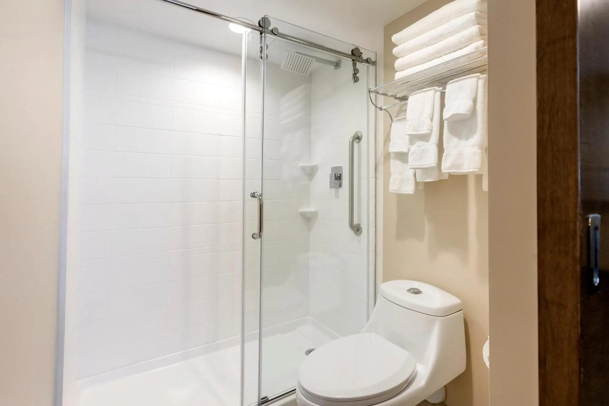 Shower in Country Inn & Suites by Radisson, Grandville-Grand Rapids West, MI