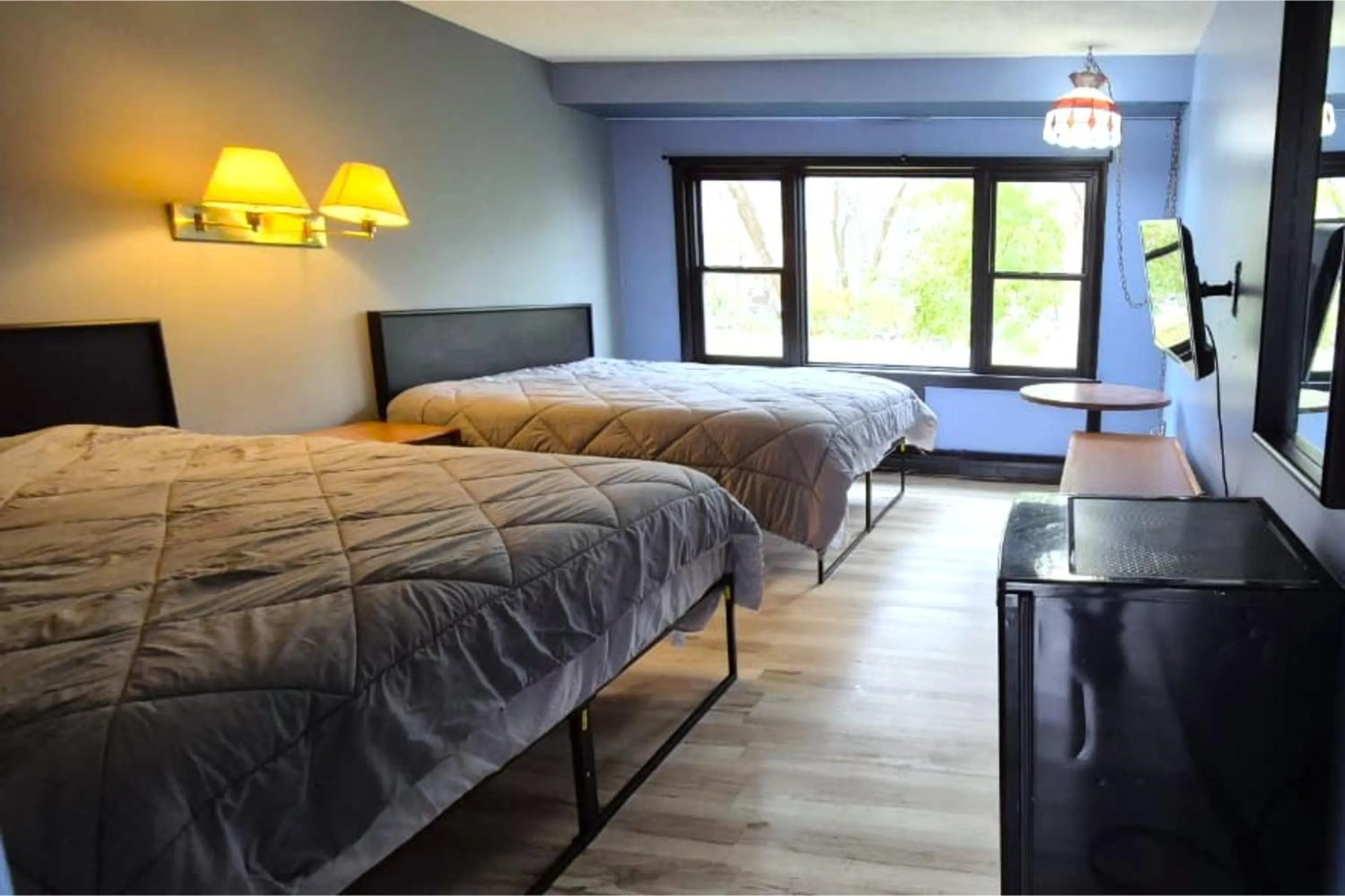 Bedroom, Bed in Capital O Swan Inn Comstock Park