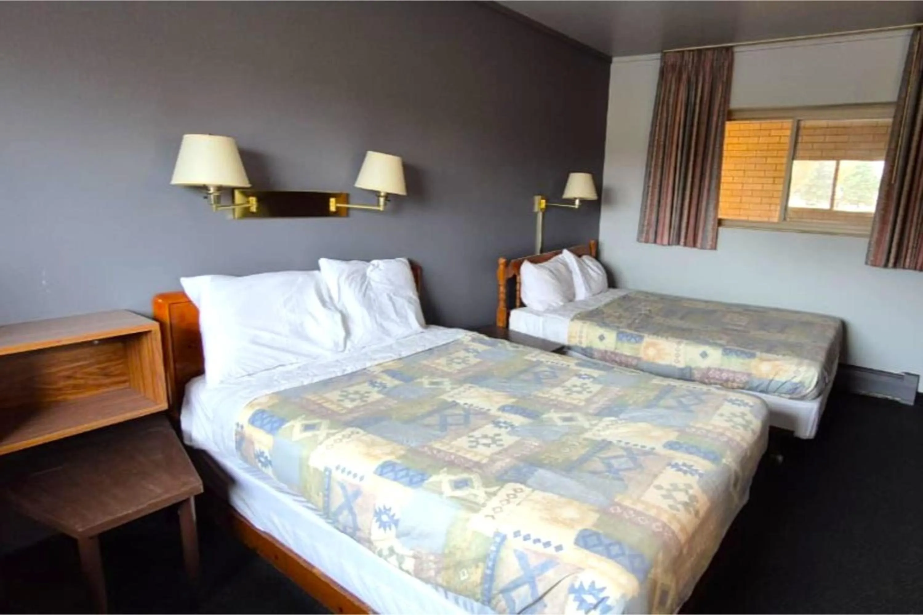 Bedroom, Bed in Capital O Swan Inn Comstock Park