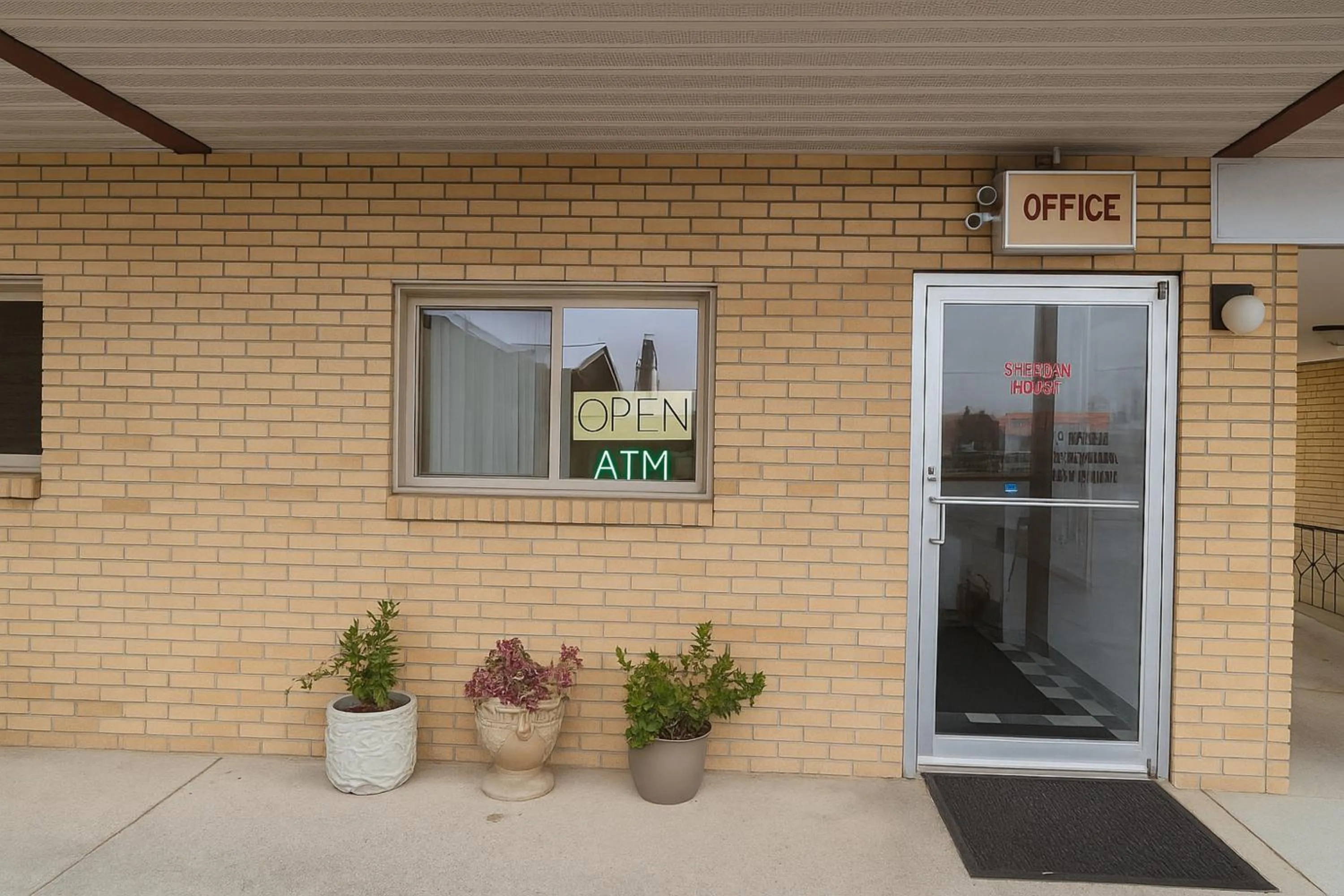 Lobby or reception in Capital O Swan Inn Comstock Park