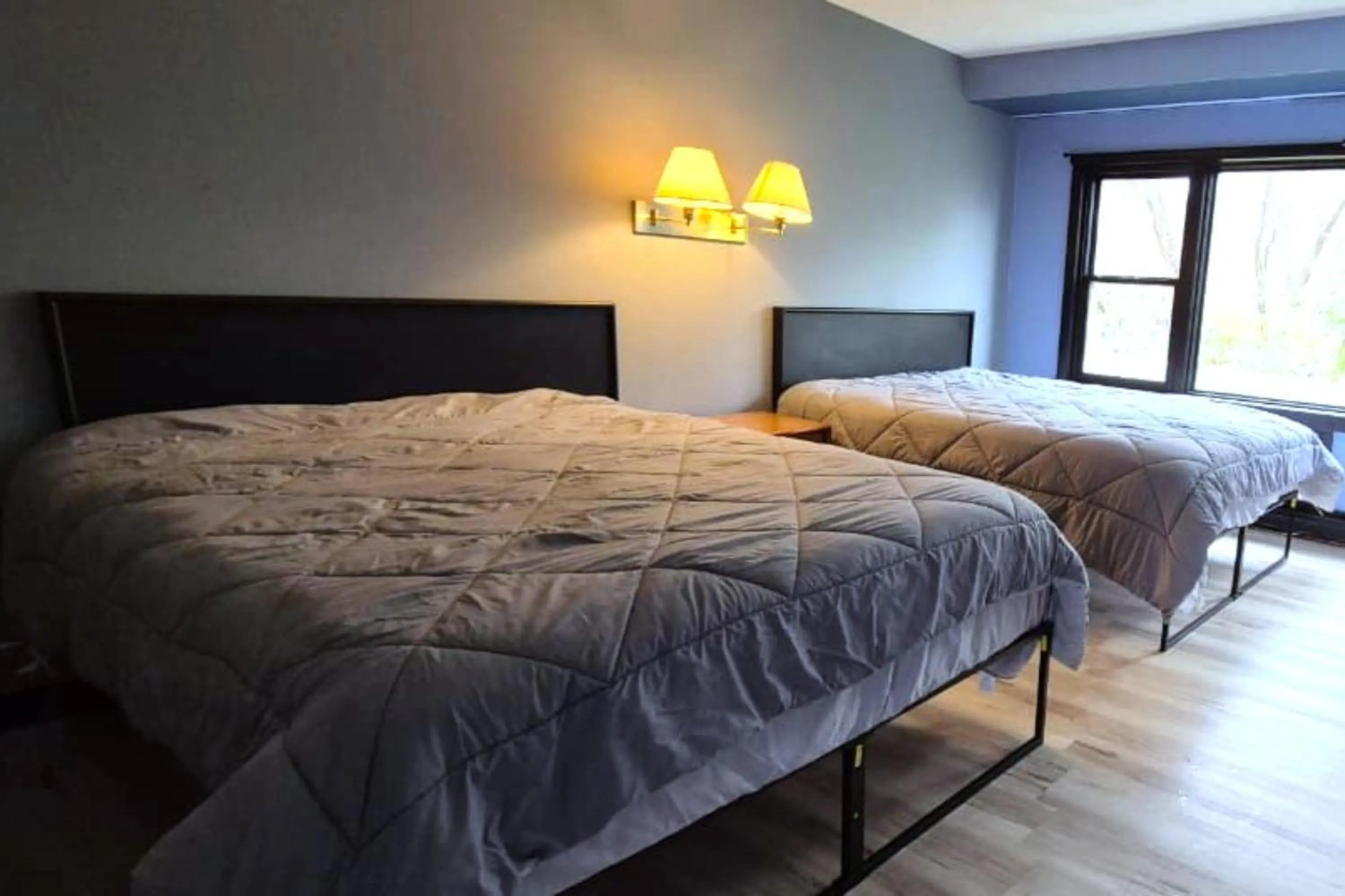 Bedroom, Bed in Capital O Swan Inn Comstock Park