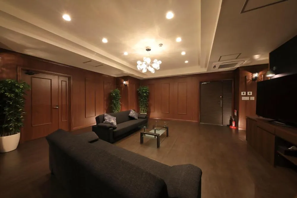 Communal lounge/ TV room in Terrace Garden Mihama Resort by Coldio Premium