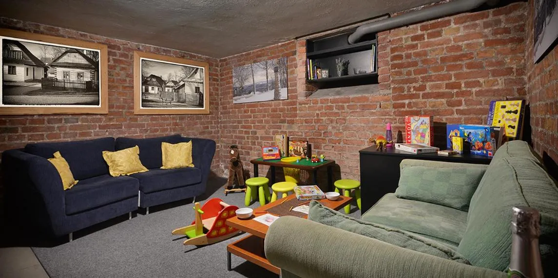 Communal lounge/ TV room in Vysocina Design Apartments