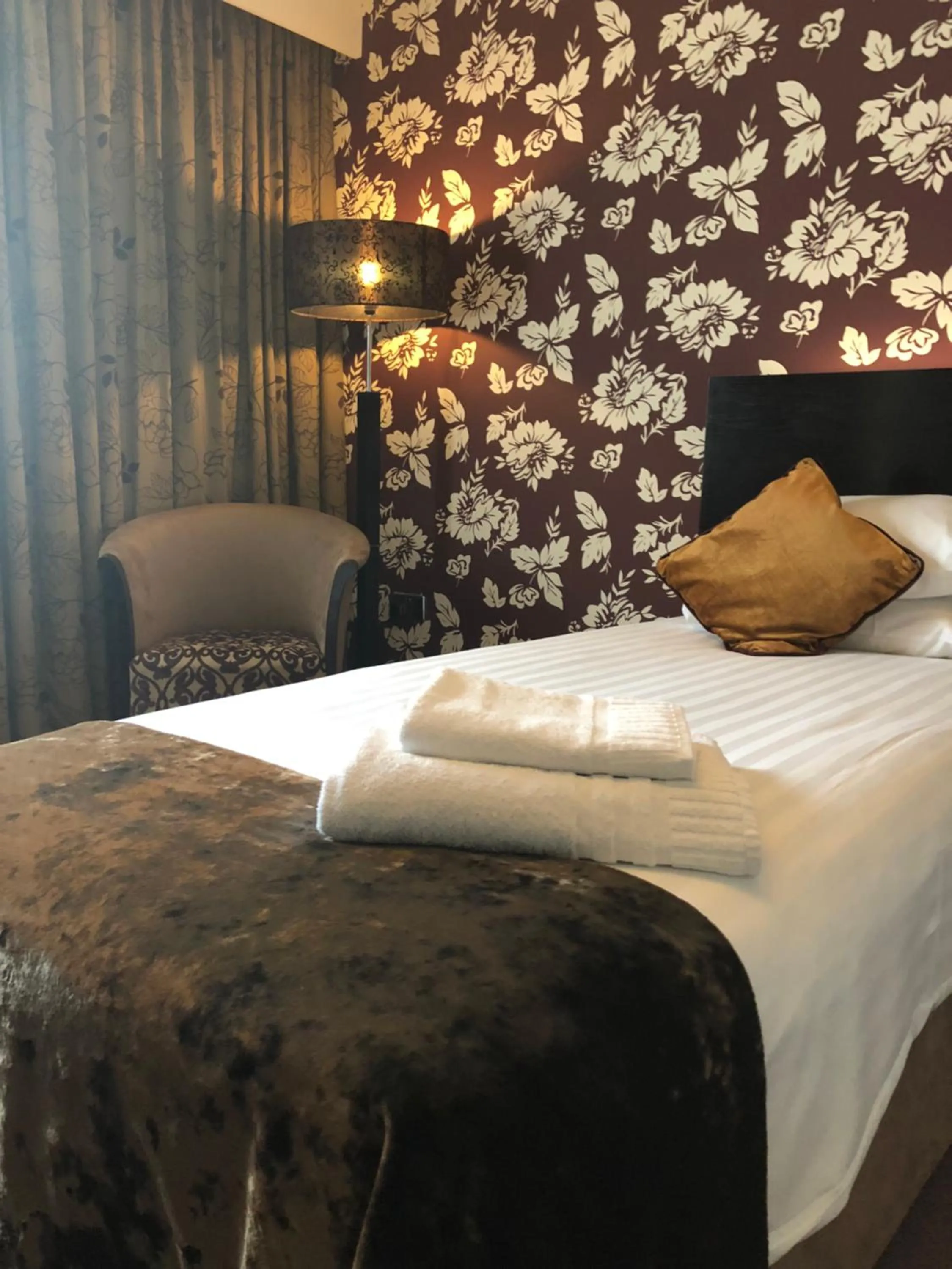 Bed in The BlueBell Hotel