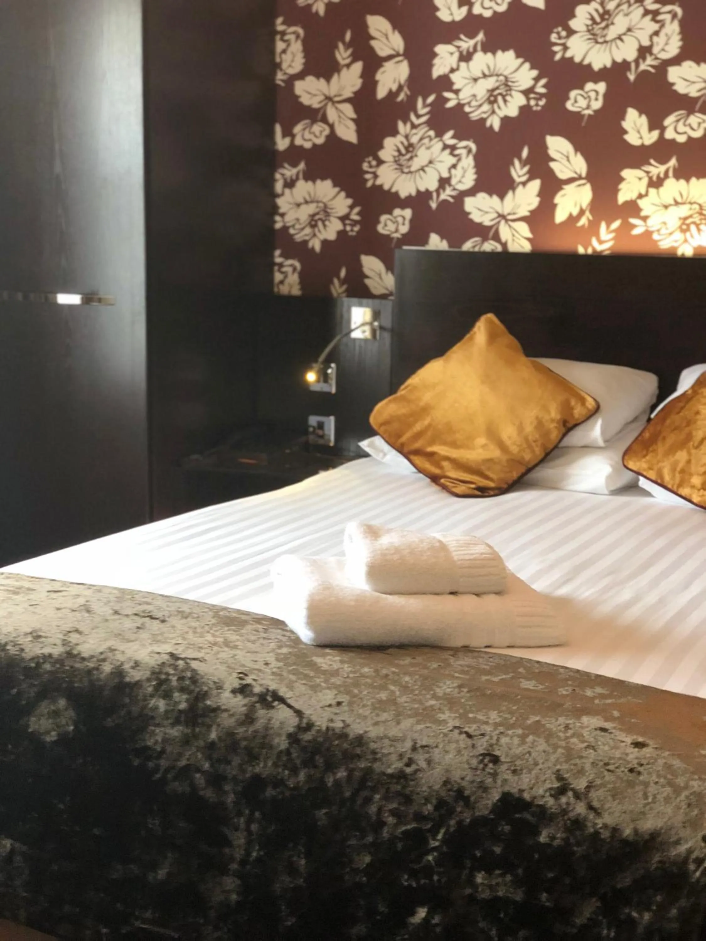 Bed in The BlueBell Hotel