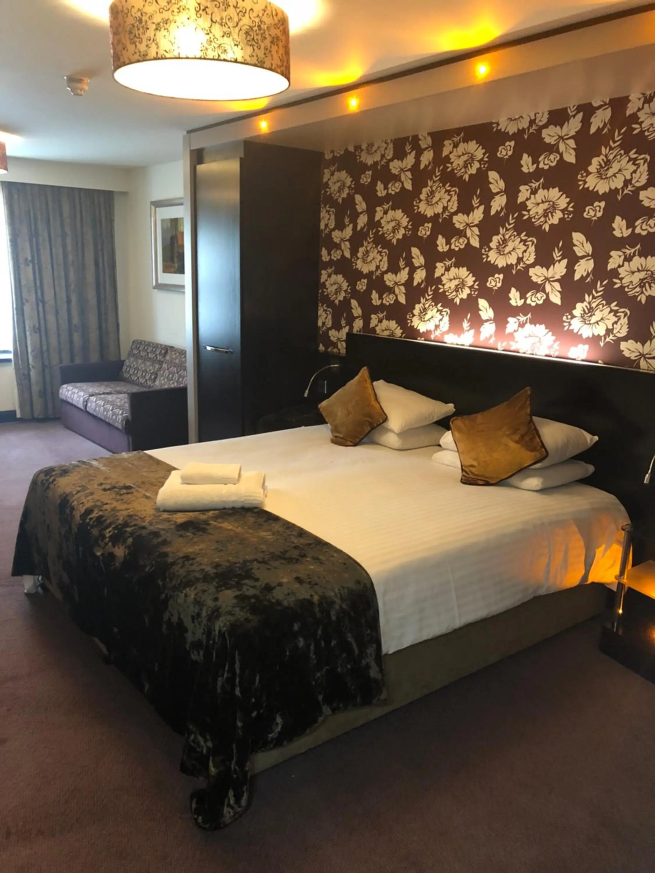 Bed in The BlueBell Hotel