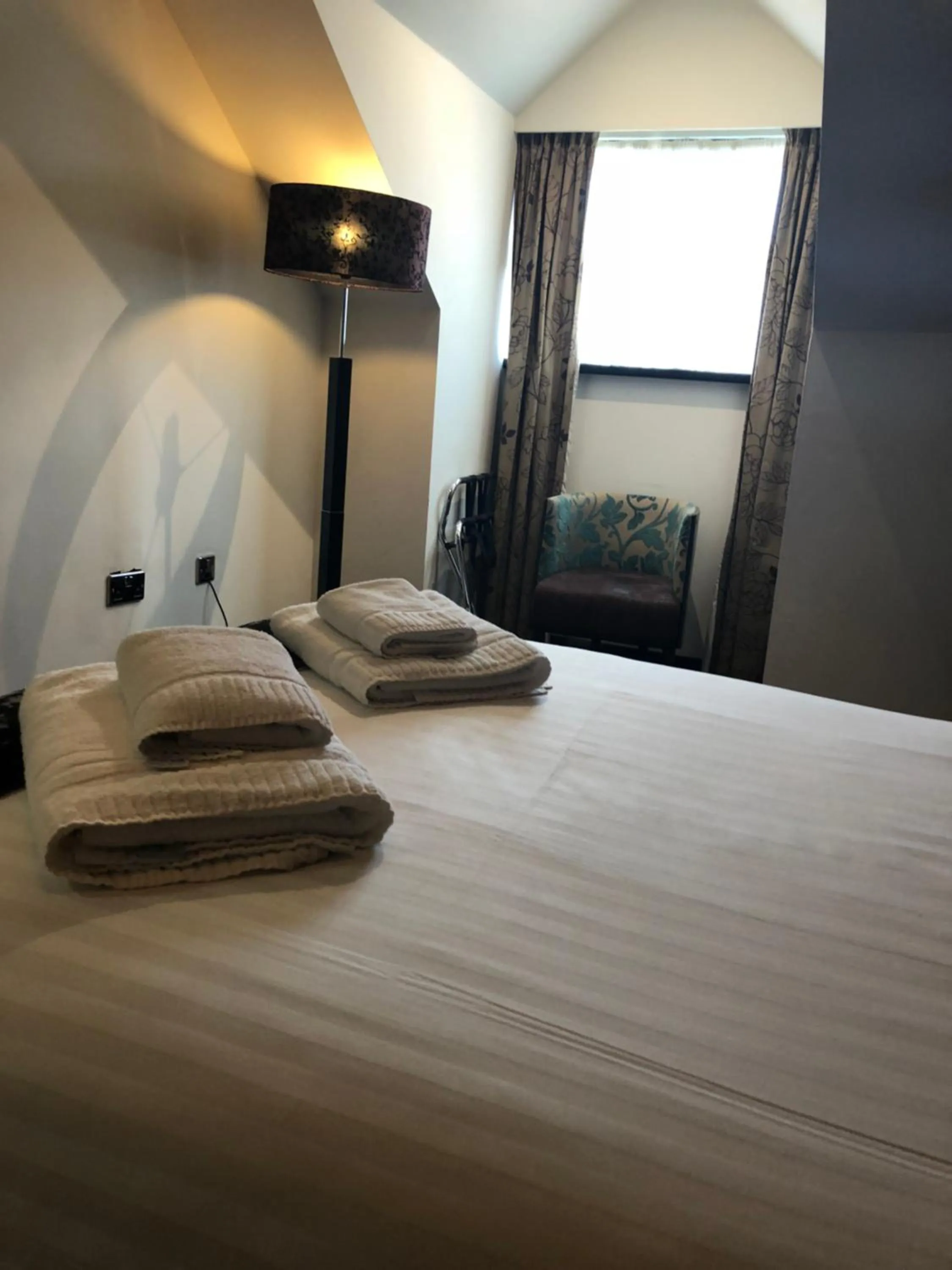 Bed in The BlueBell Hotel