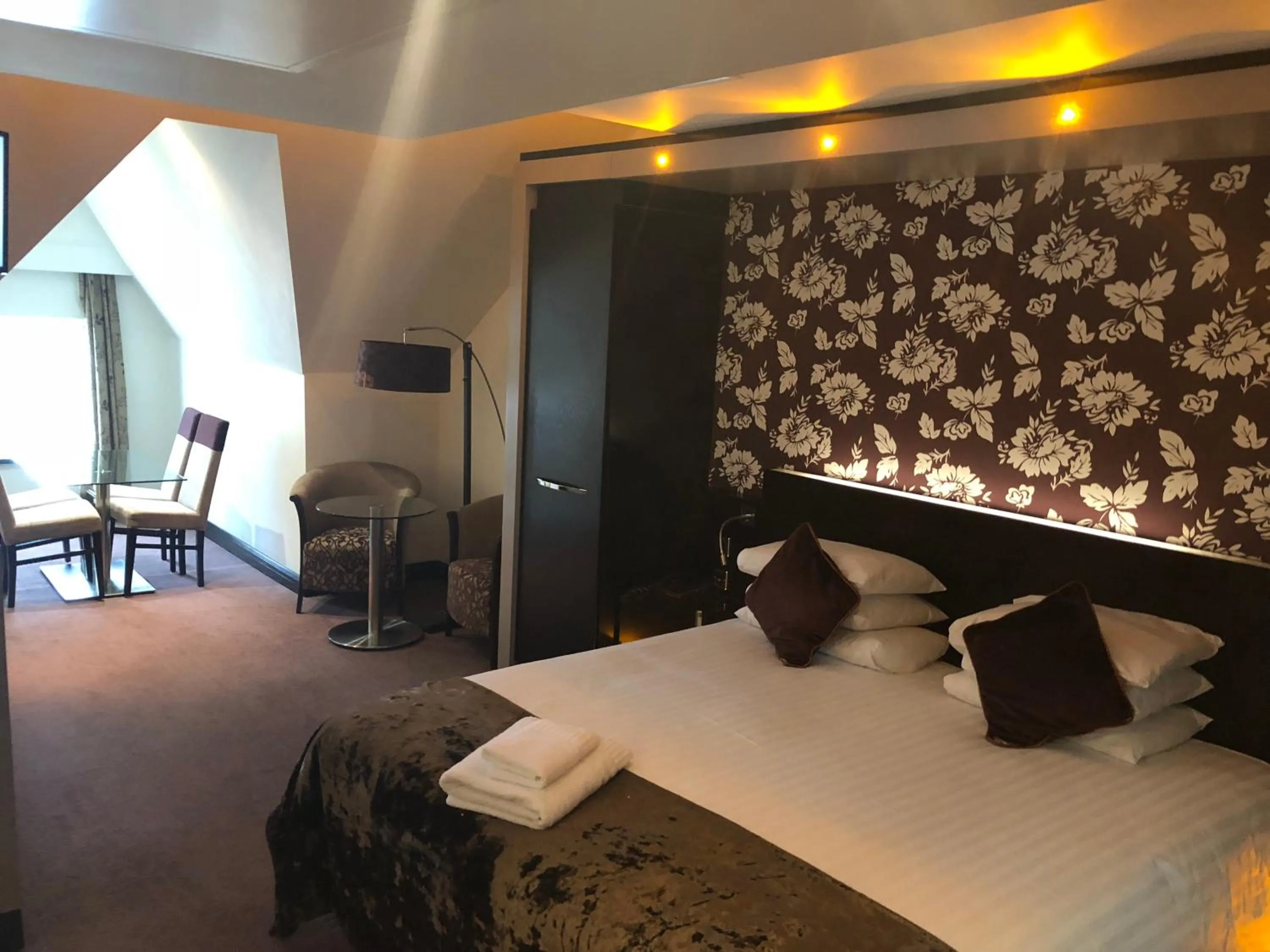 Bed in The BlueBell Hotel