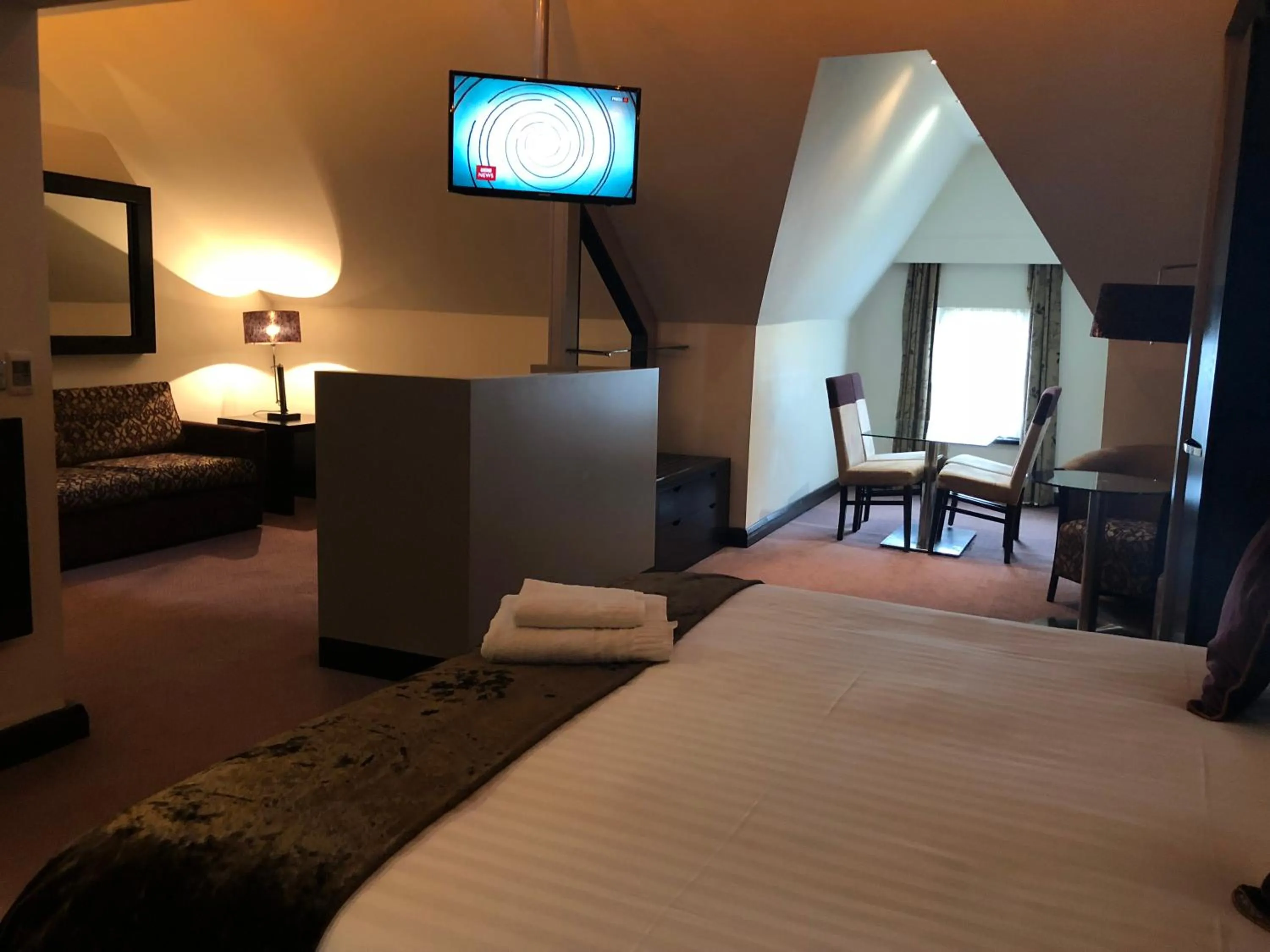 Bed in The BlueBell Hotel