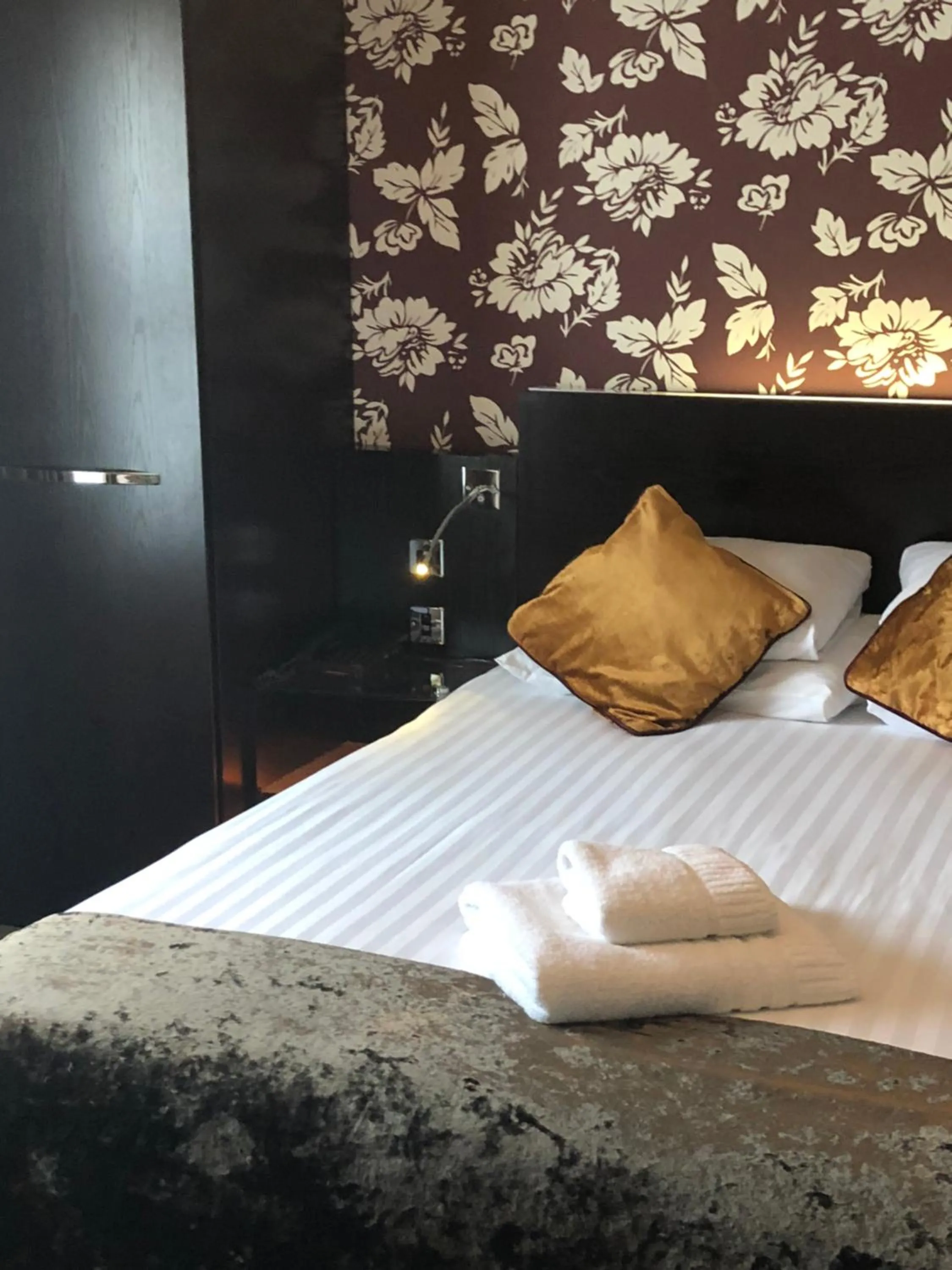 Bed in The BlueBell Hotel