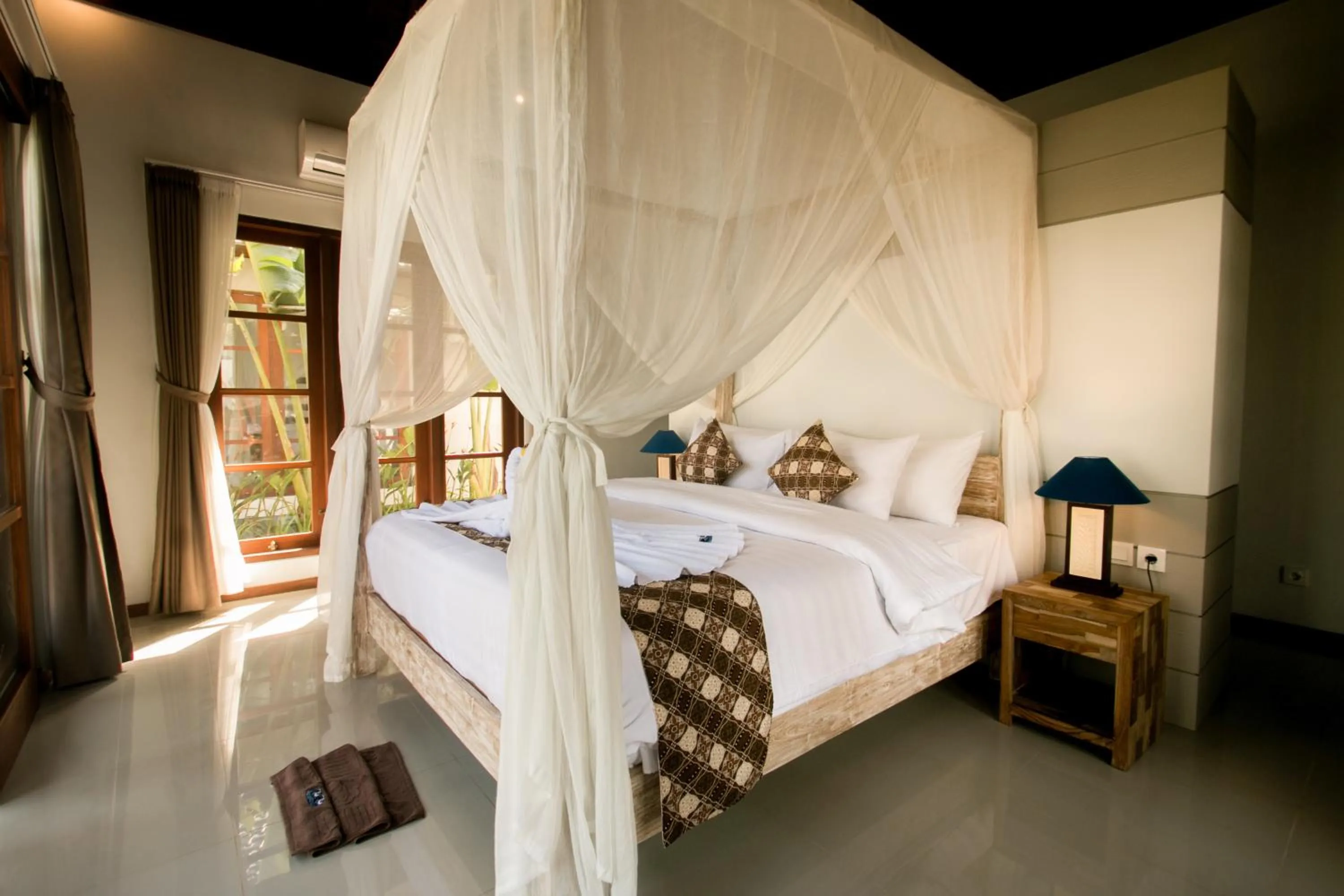 Bed in The Secret Spot Villas
