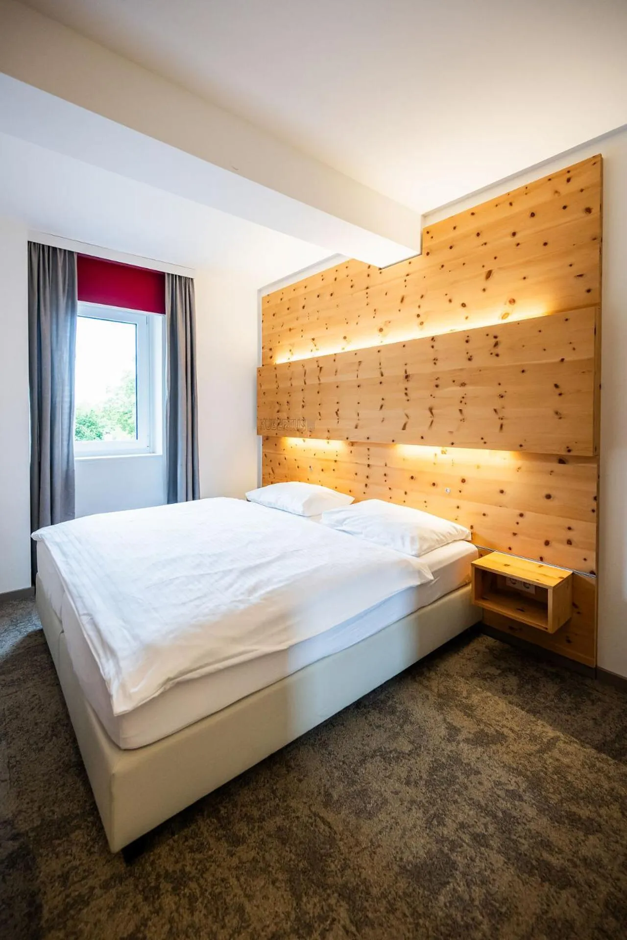 Bed in Motel Zeltweg - Self-Check-in