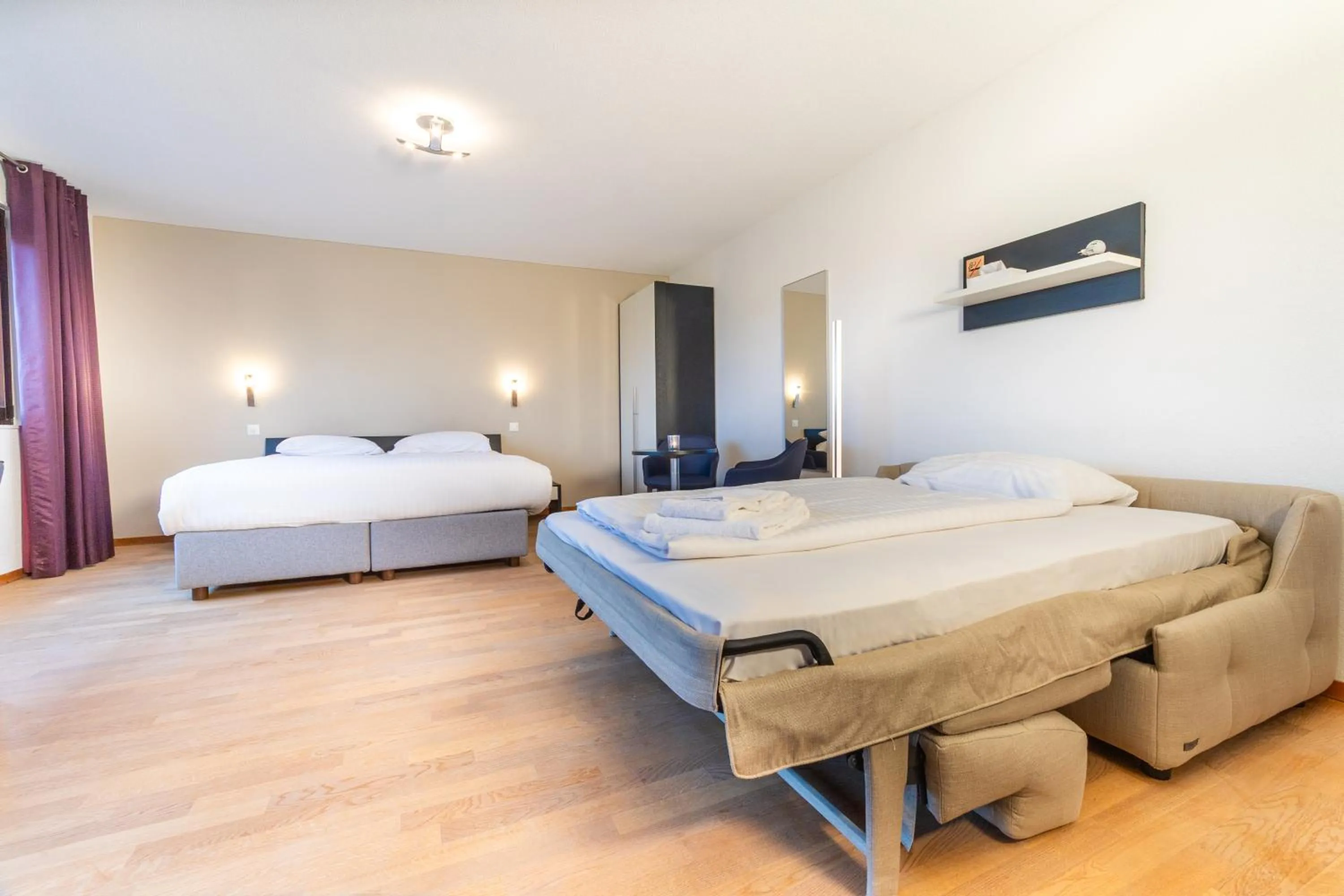 Bed in Jura Sport & Spa Resort