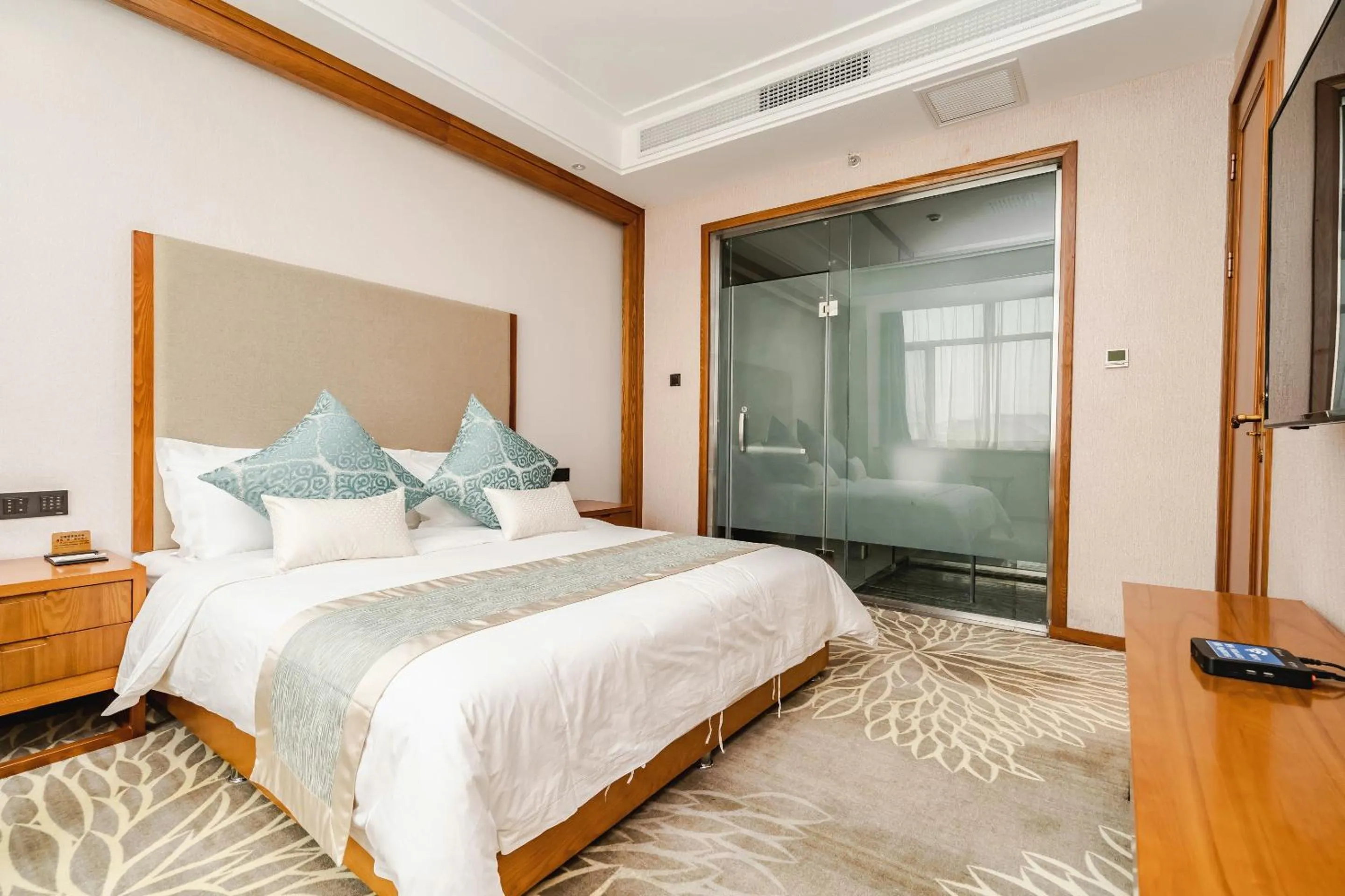 Bed in Fu Hua International Hotel Dunhuang