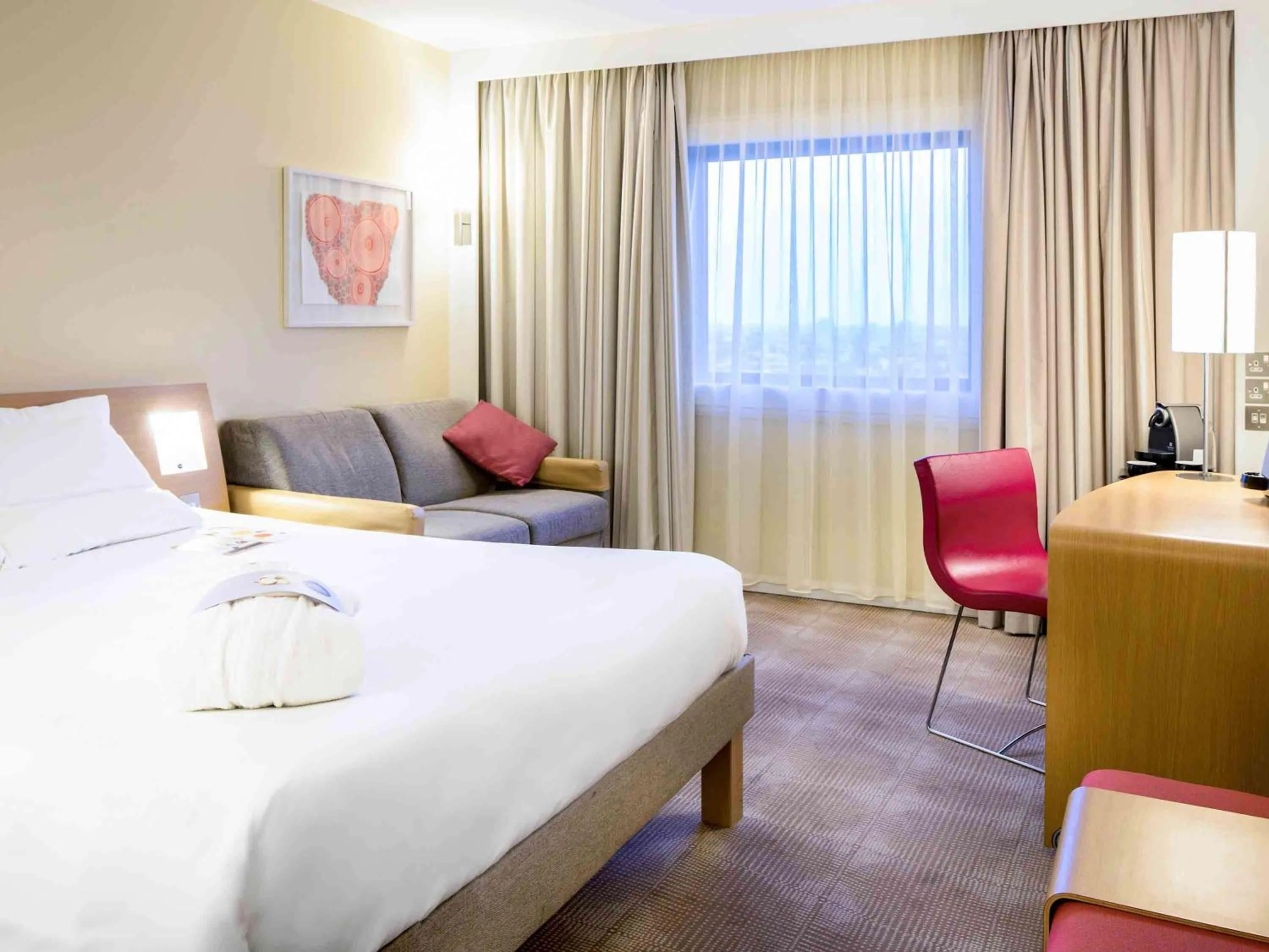 Photo of the whole room, Bed in Novotel London Paddington