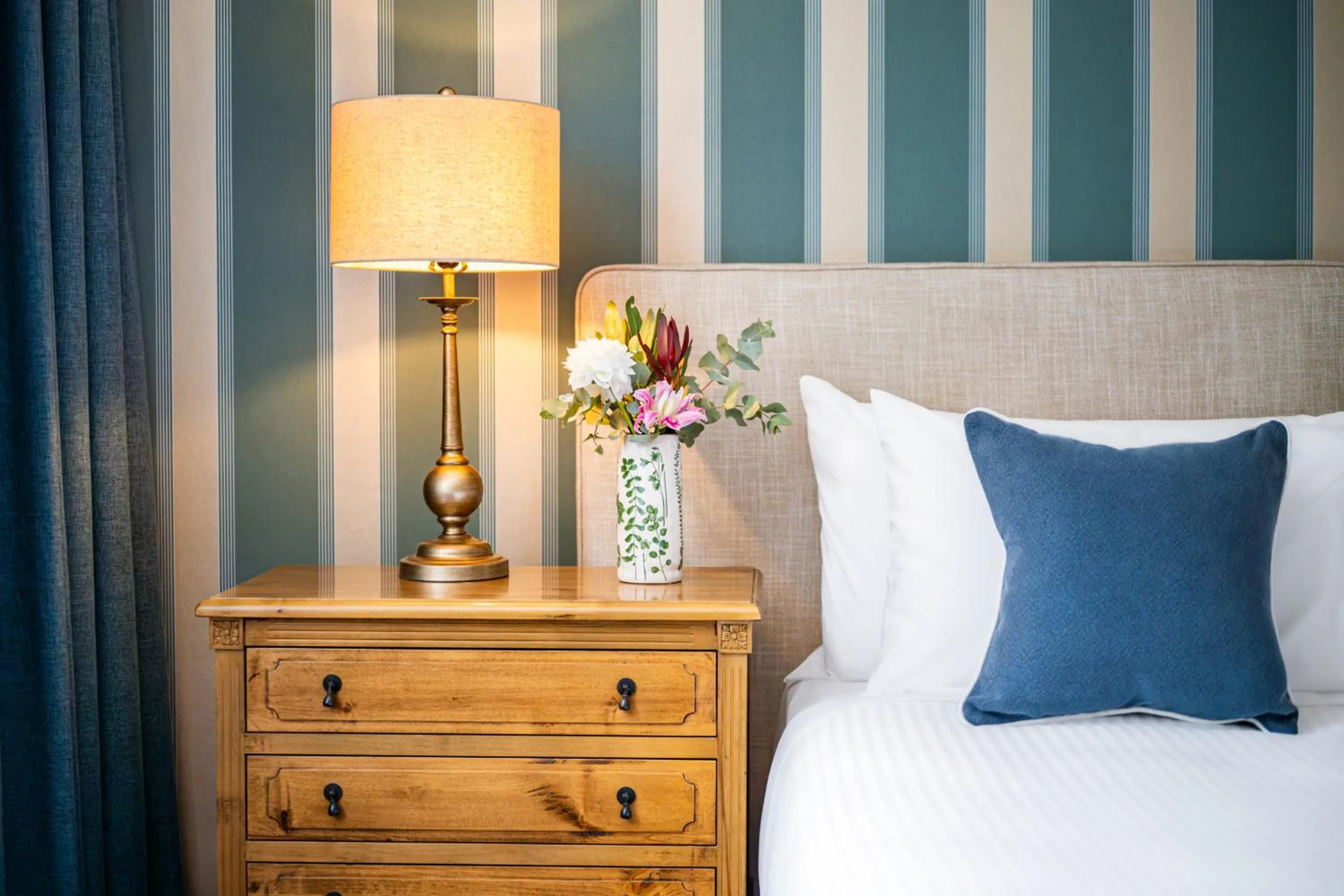 Bed in The Russell Boutique Hotel