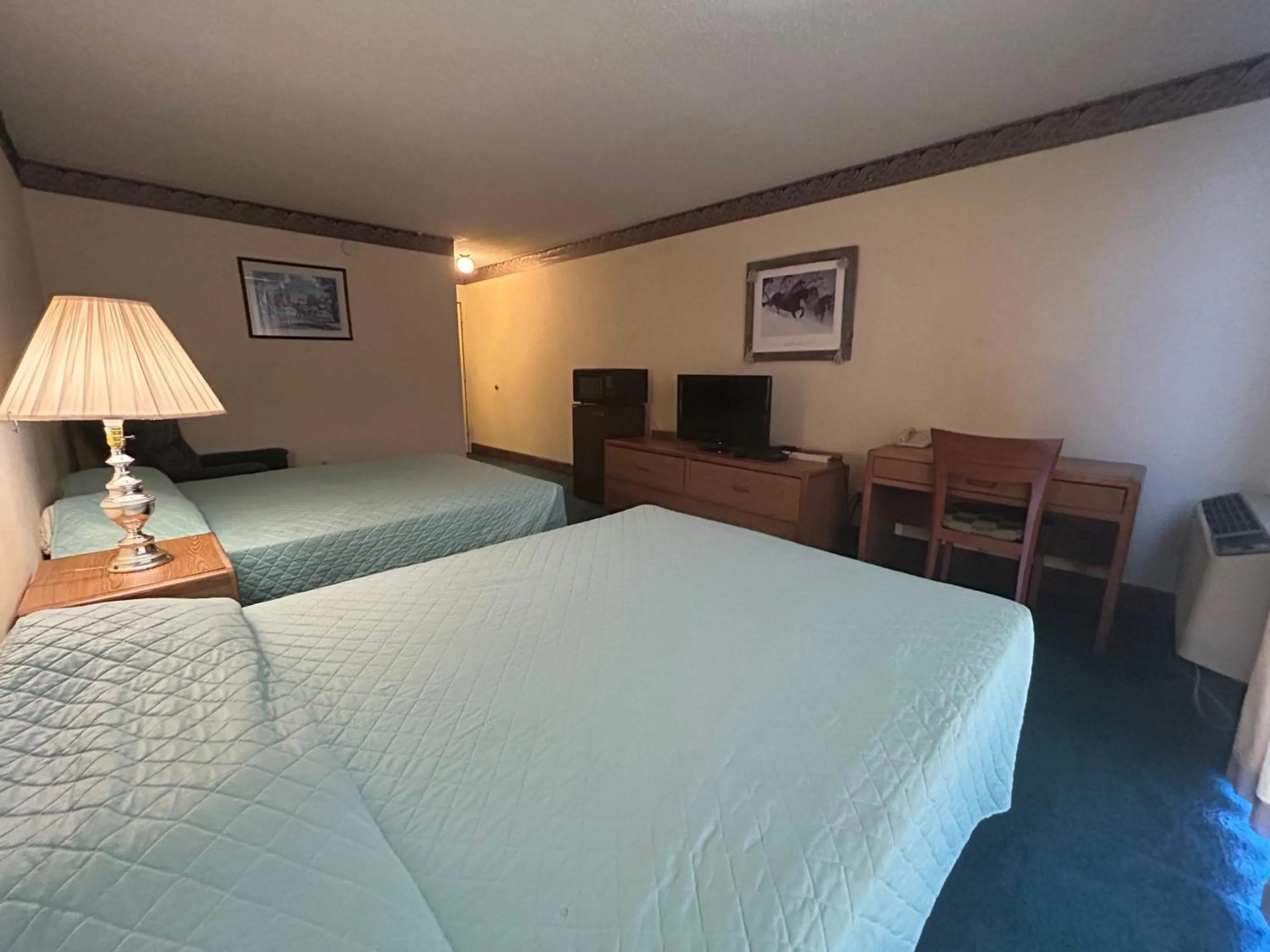 Bedroom, Bed in Candlelight Inn by Capital O Scottsbluff