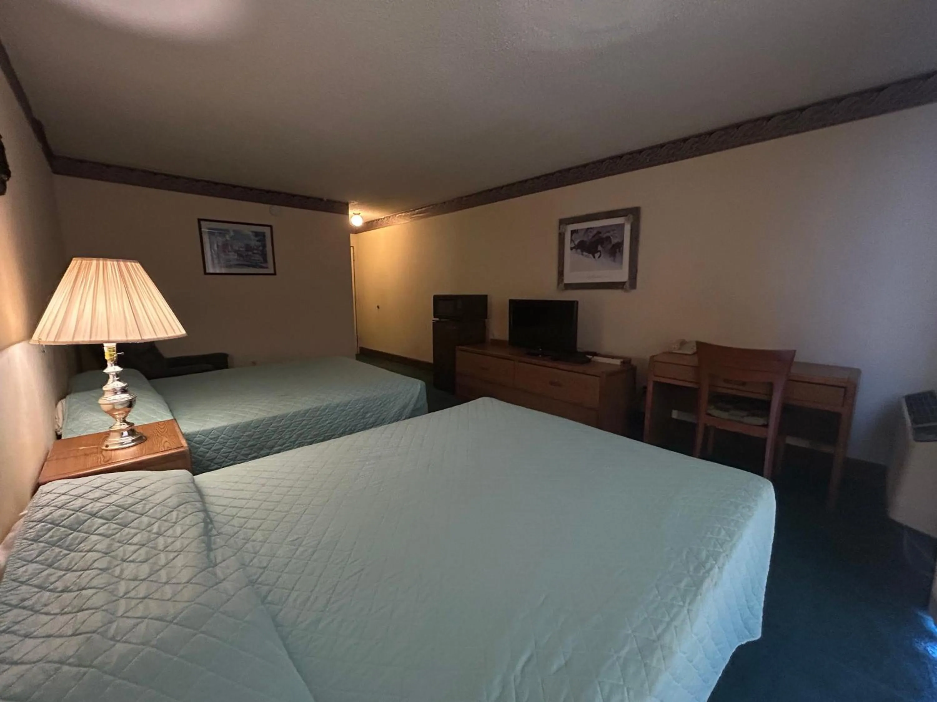 Bedroom, Bed in Candlelight Inn by Capital O Scottsbluff