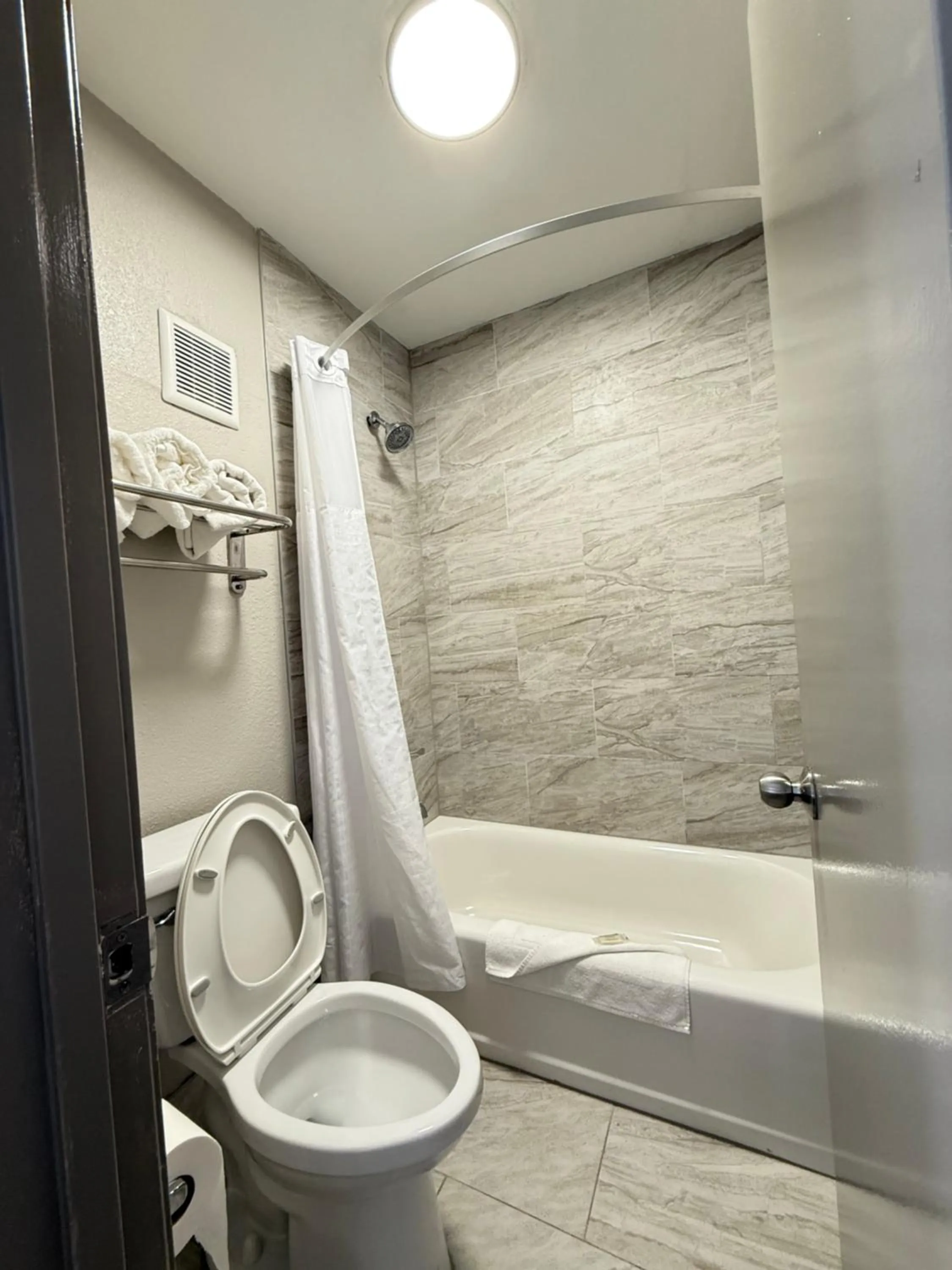 Bathroom in Days Inn by Wyndham Shorter