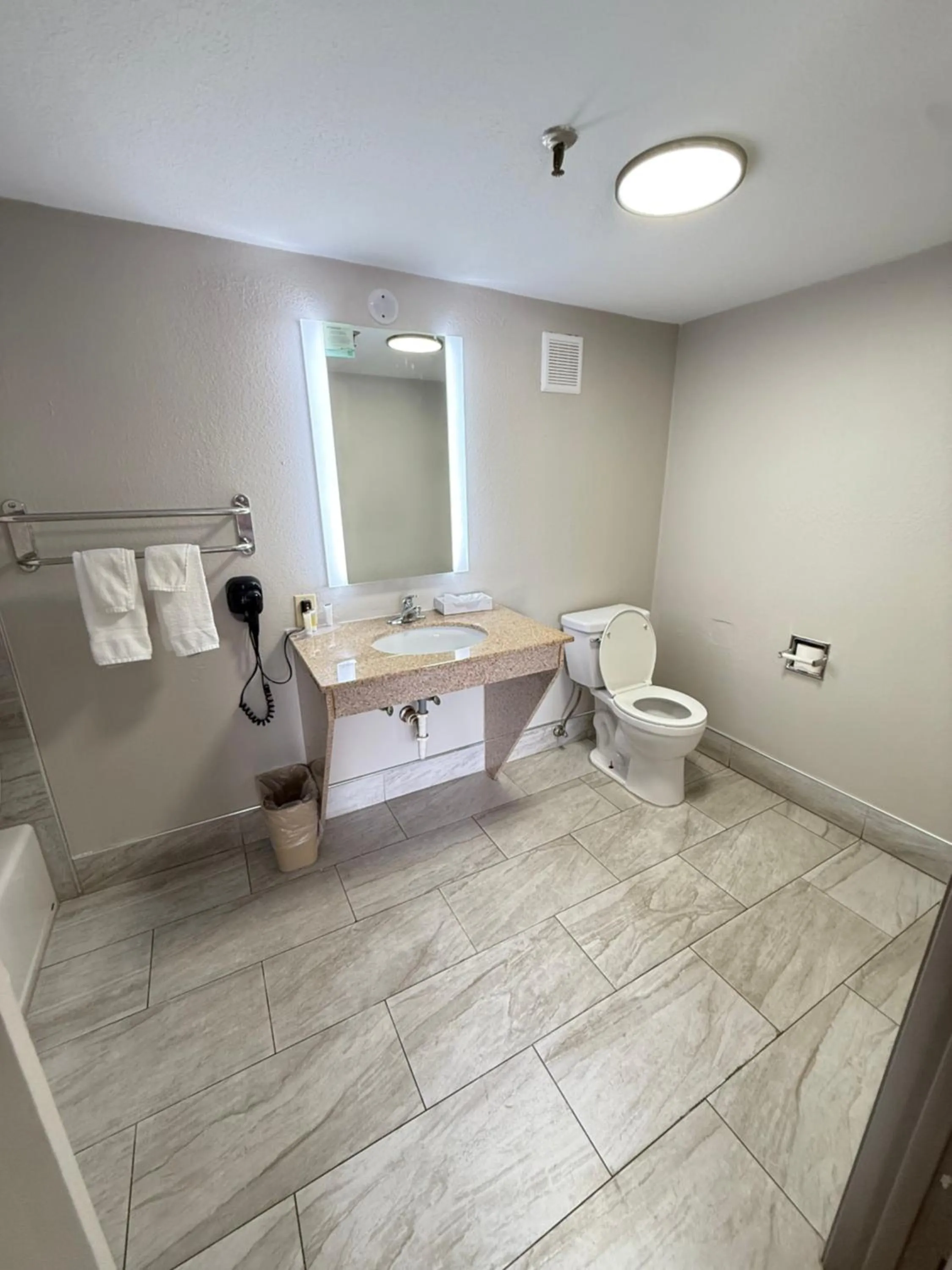 Toilet in Days Inn by Wyndham Shorter