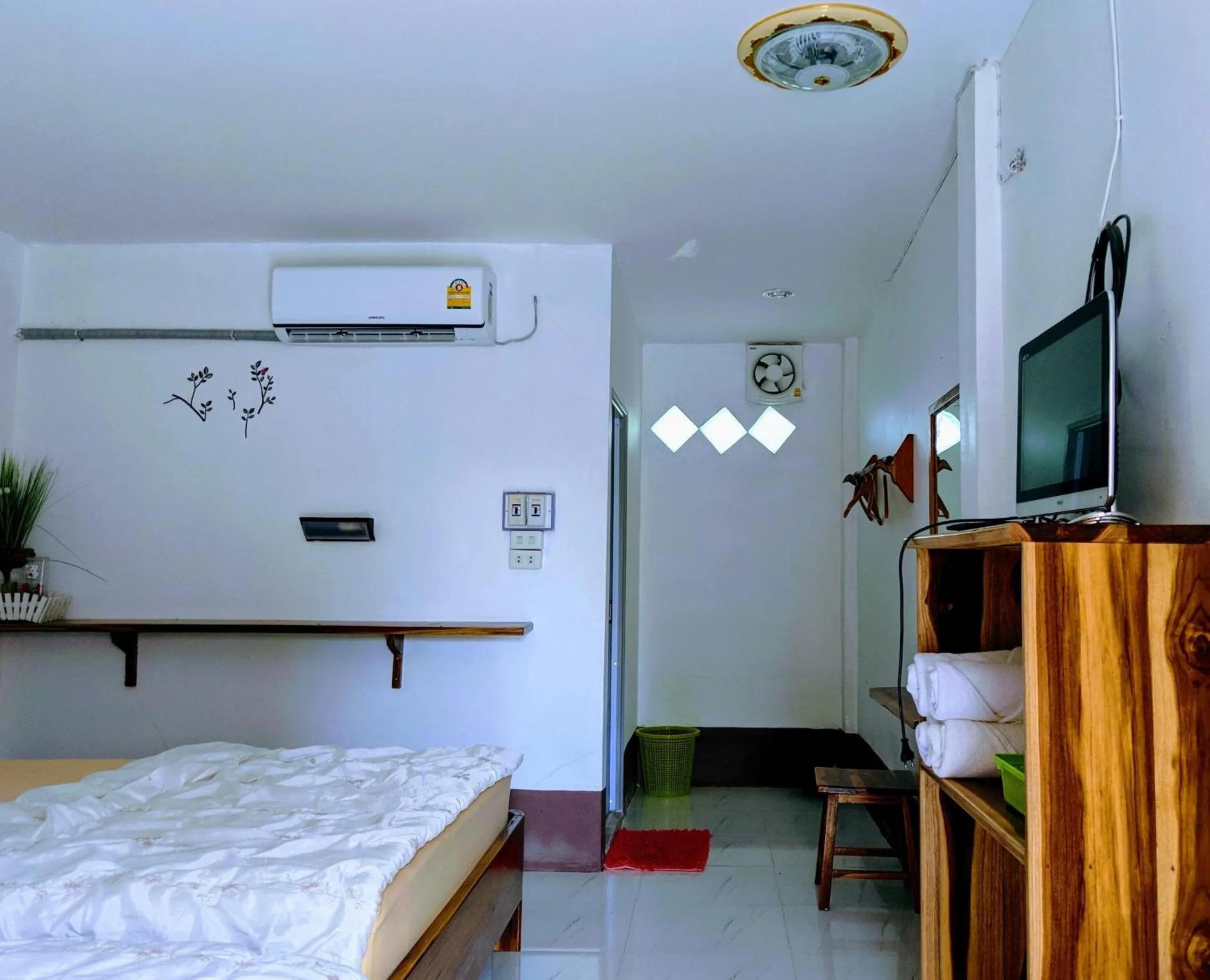 Bed in Bansuanphuhong Resort