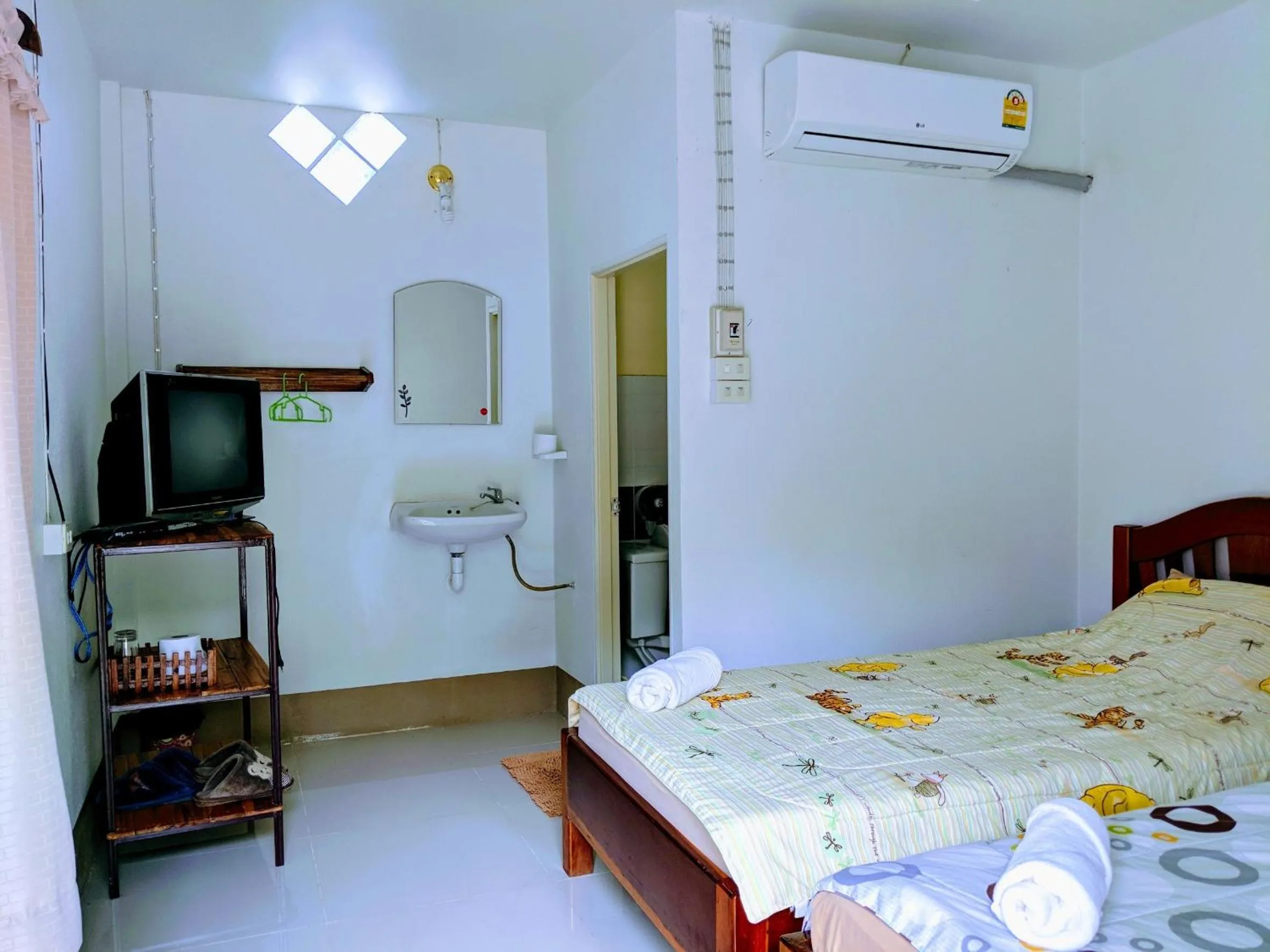 Bed in Bansuanphuhong Resort