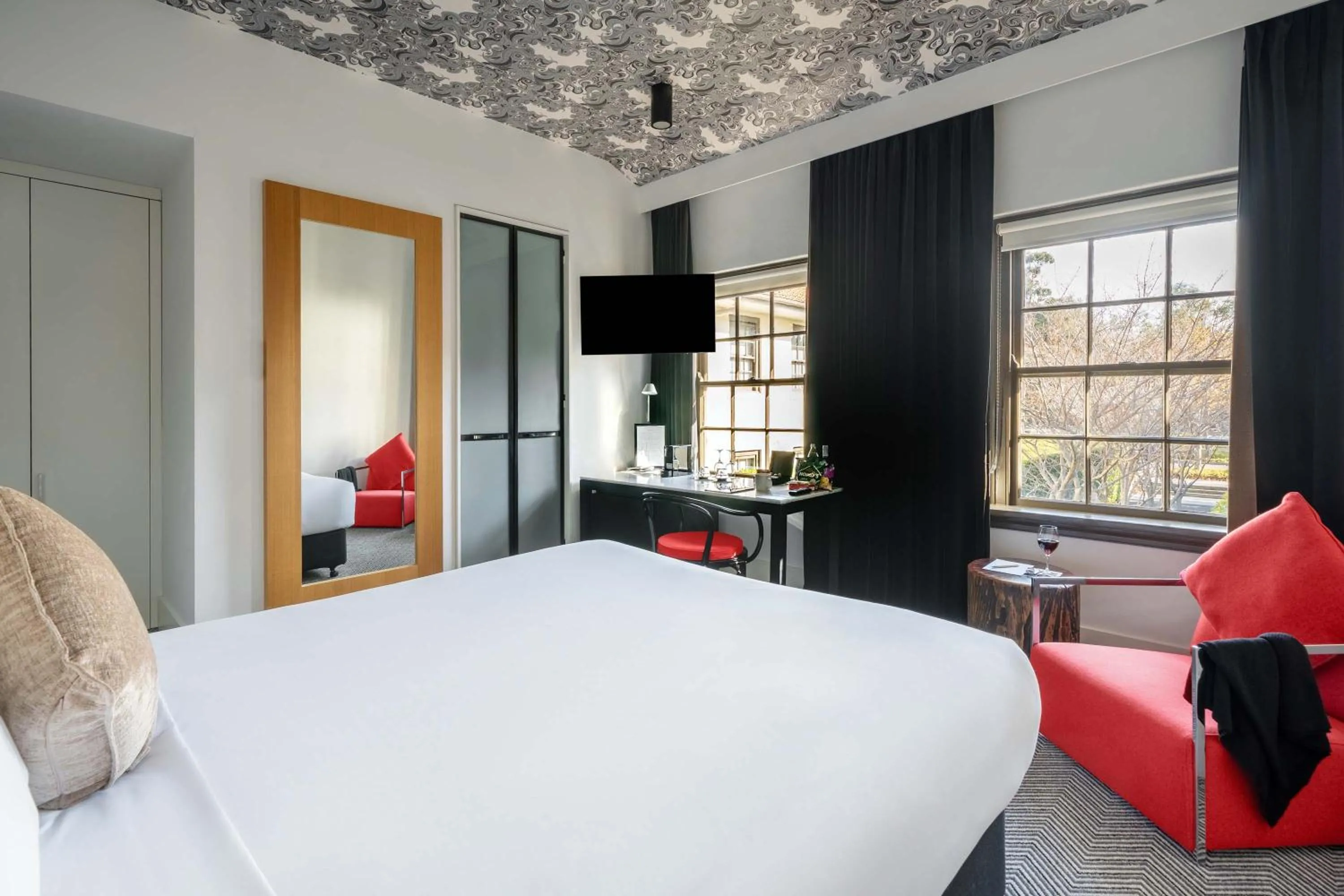 Bed in Peppers Gallery Hotel