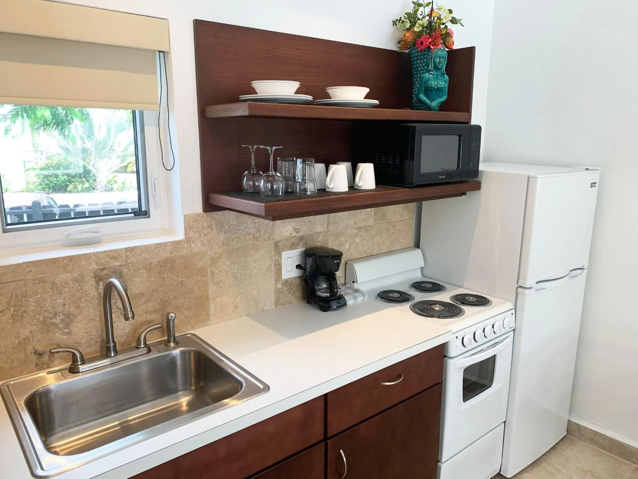 Kitchen or kitchenette in Sand Castle on the Beach - Adults Only