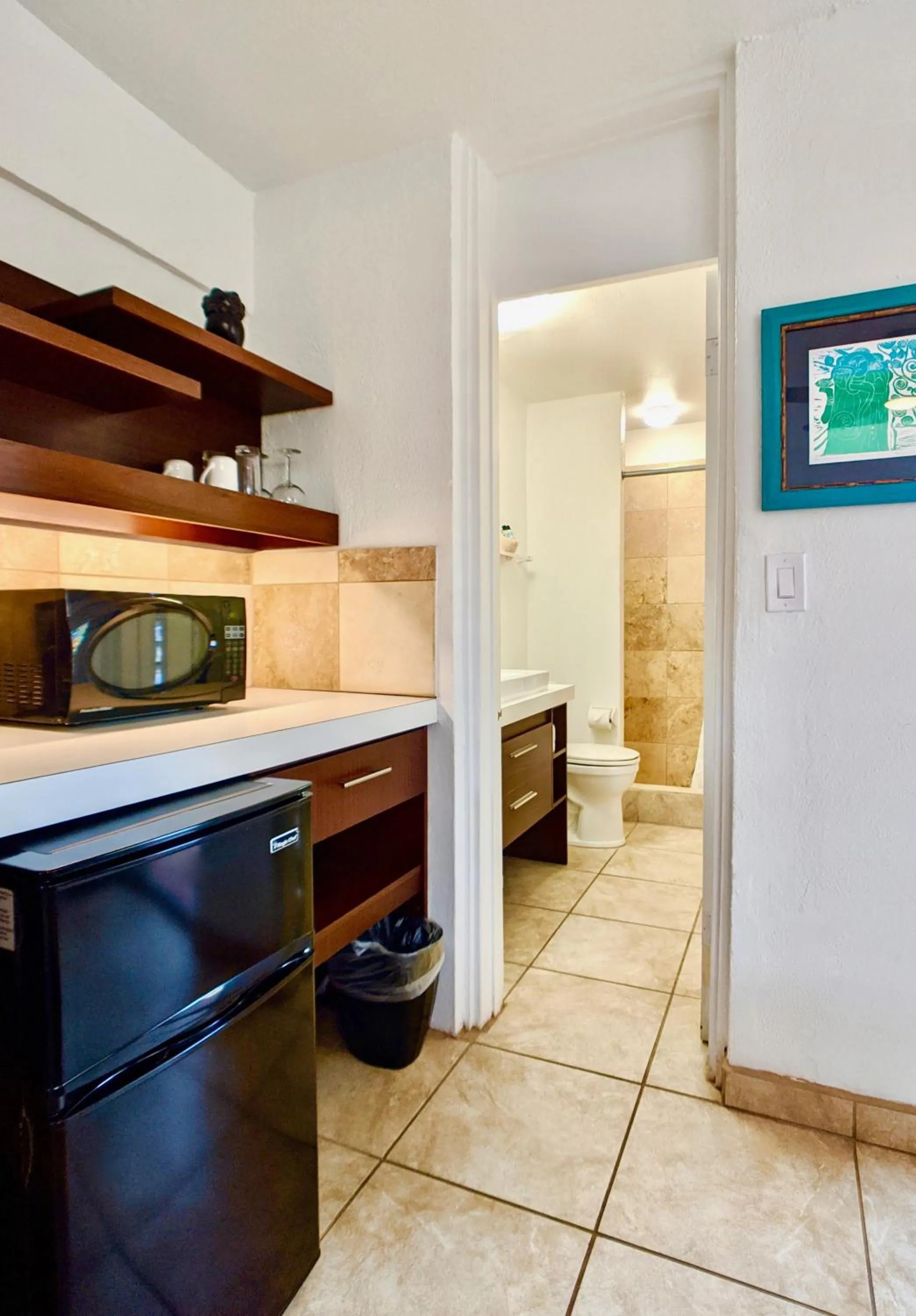 Kitchen or kitchenette in Sand Castle on the Beach - Adults Only