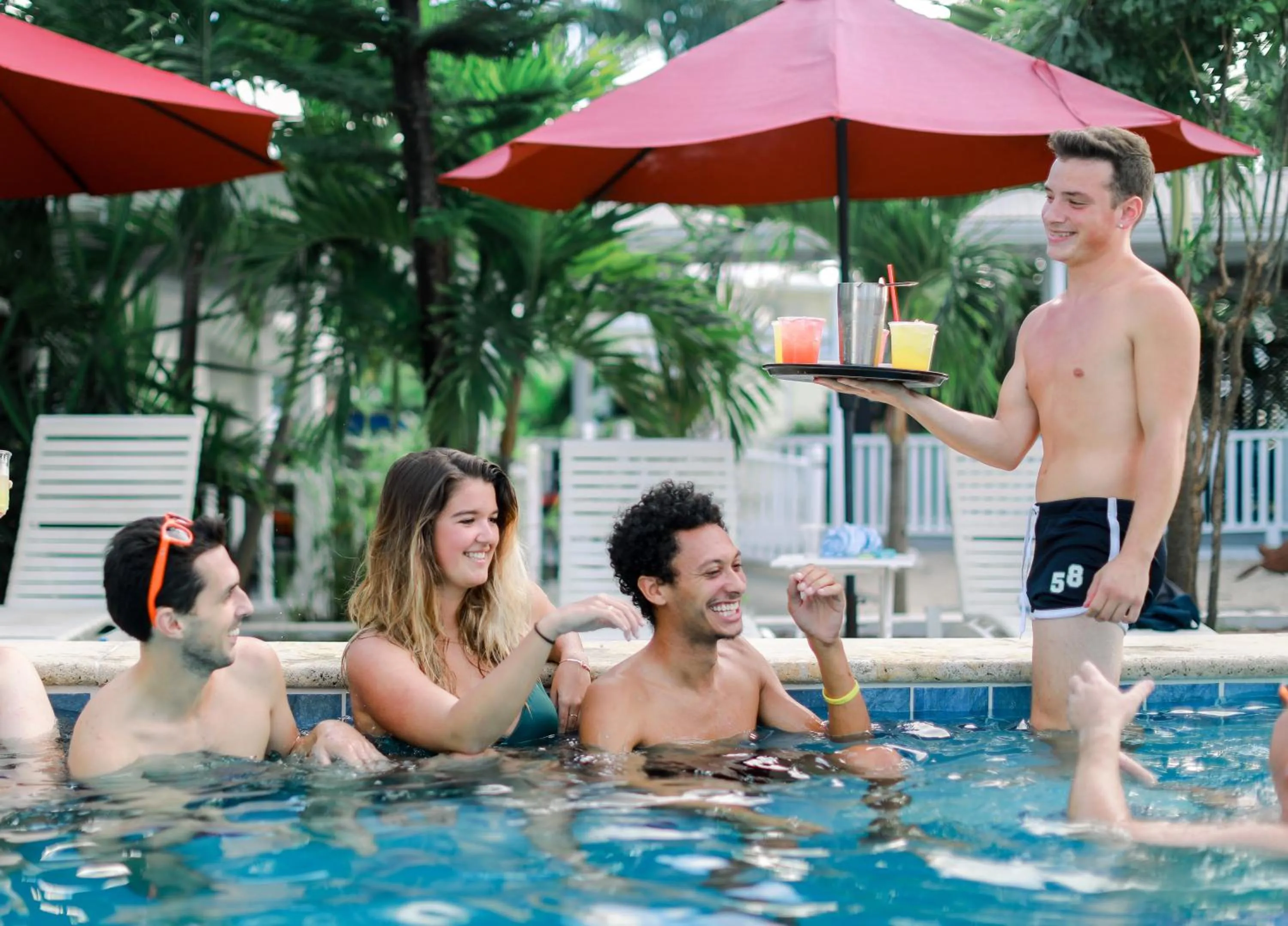 People in Sand Castle on the Beach - Adults Only