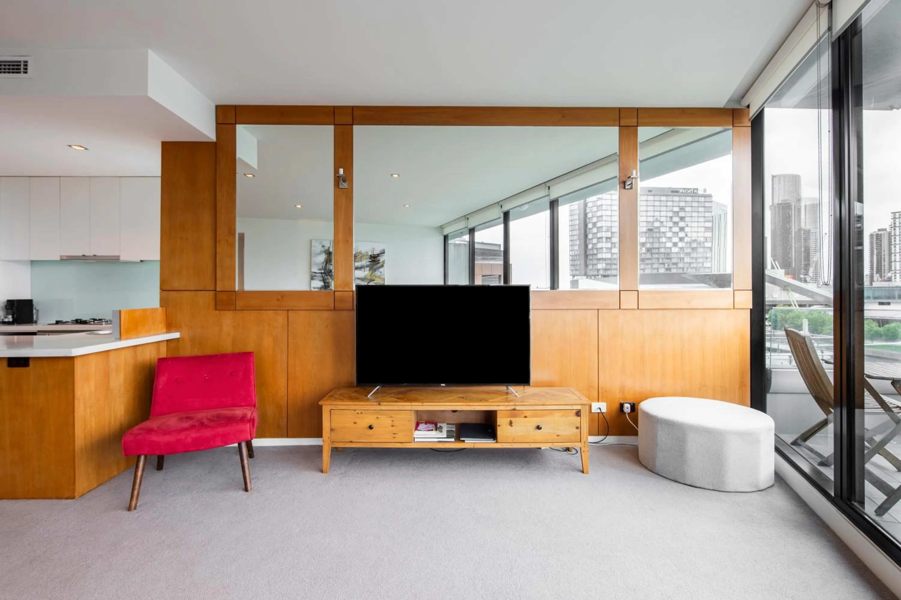 Communal lounge/ TV room in Waterfront Melbourne Apartments
