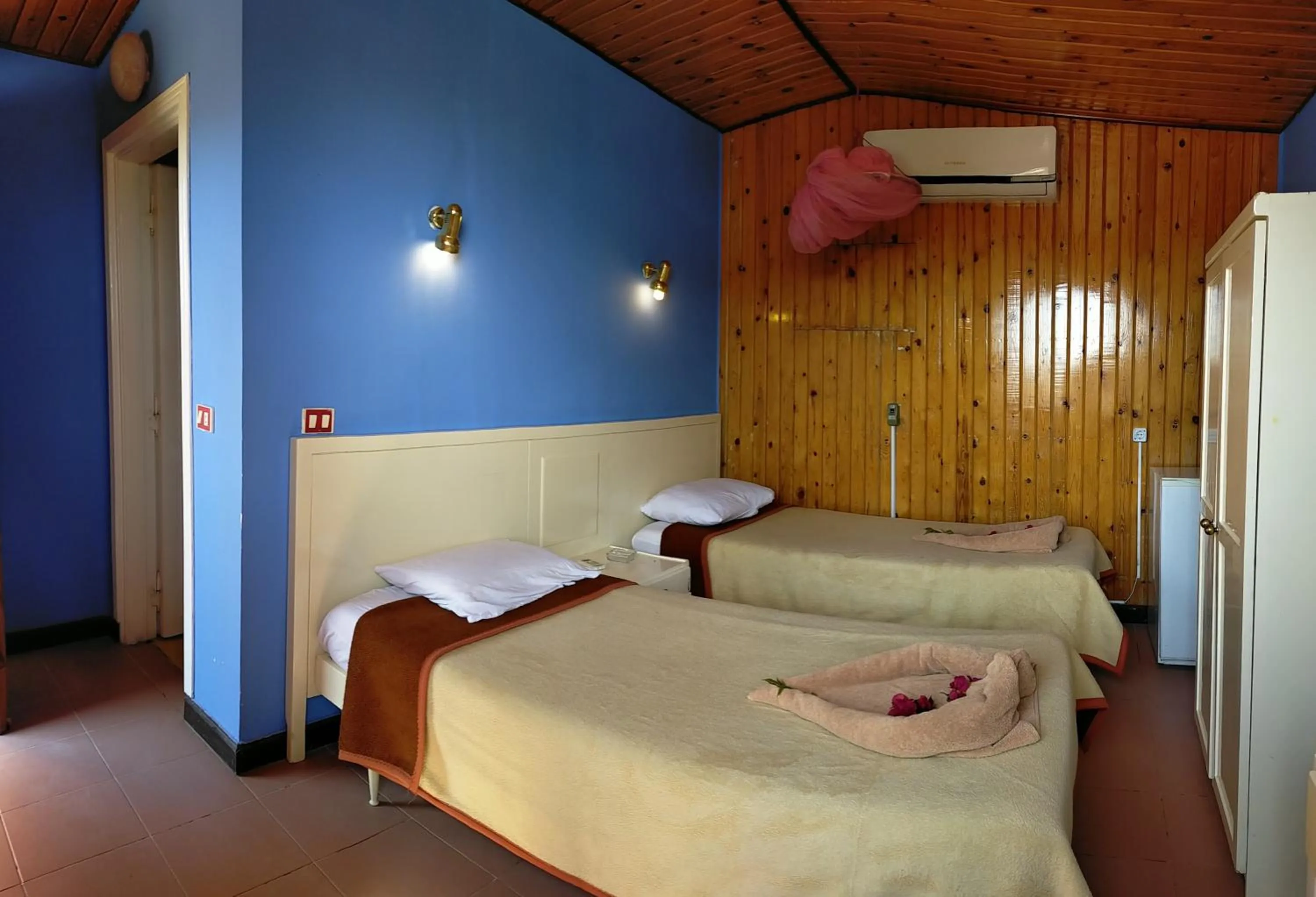 Bed in Umbi Sharks Bay Diving Village