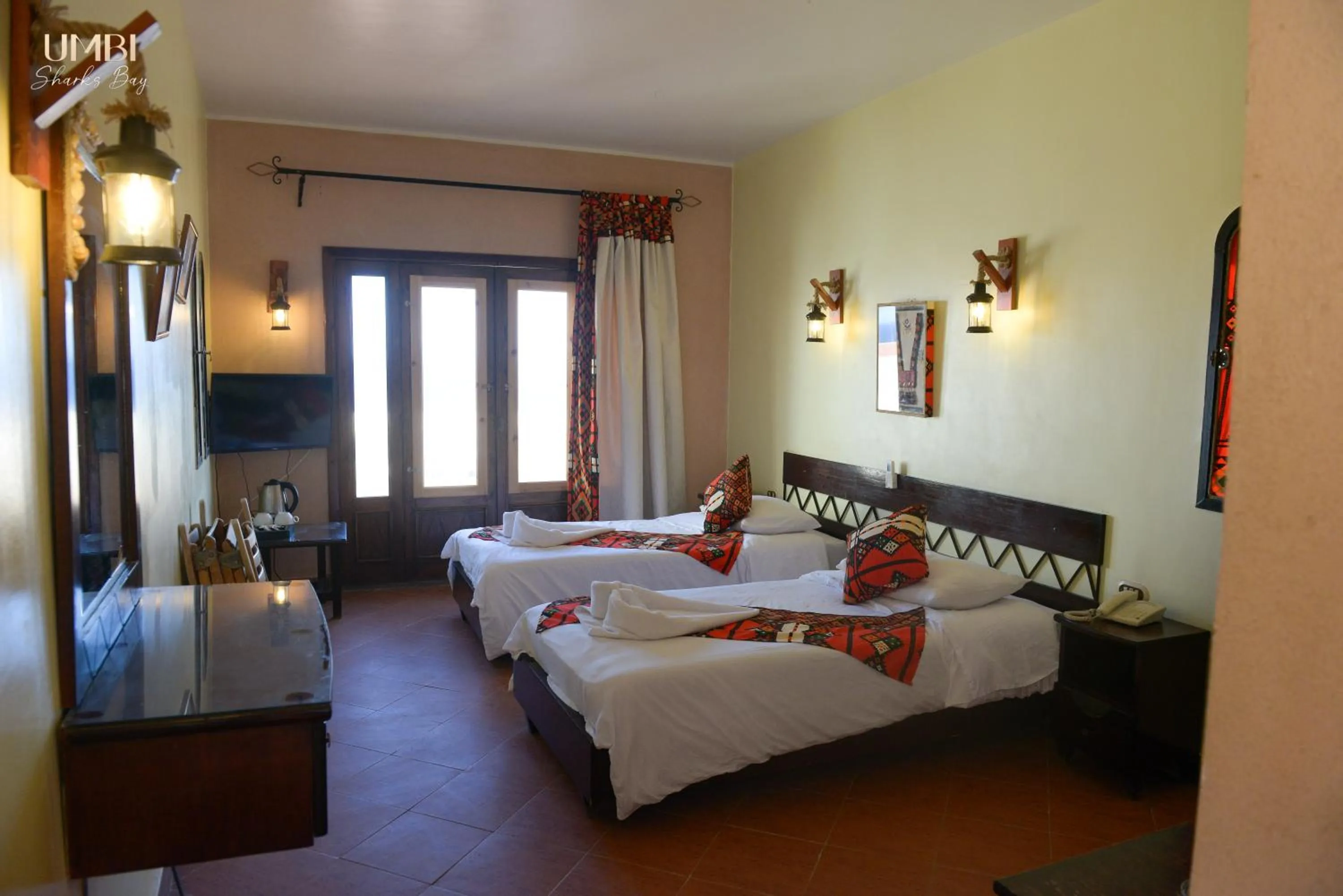 Bed in Umbi Sharks Bay Diving Village