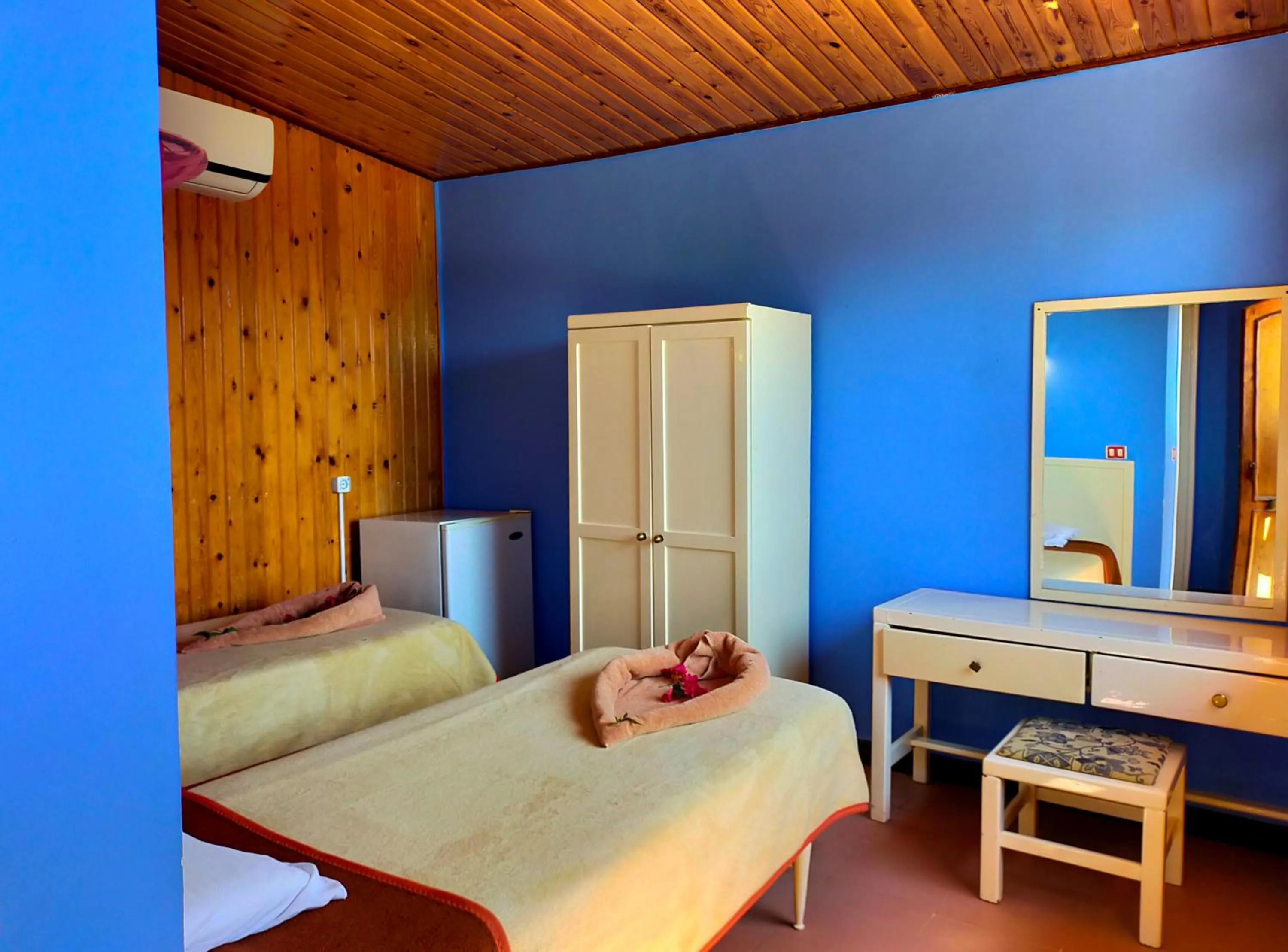 Bed in Umbi Sharks Bay Diving Village