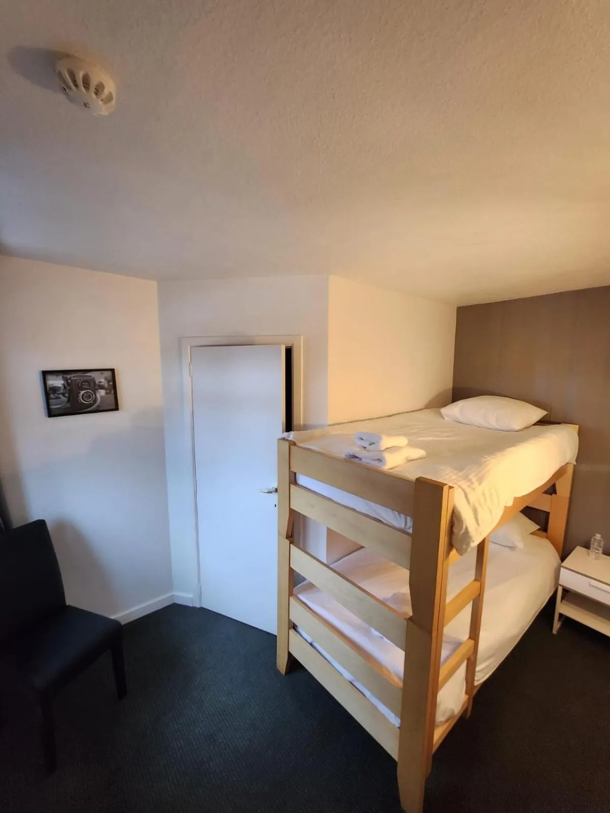 Bed in Hôtel Francorchamps Pitlane Lodge